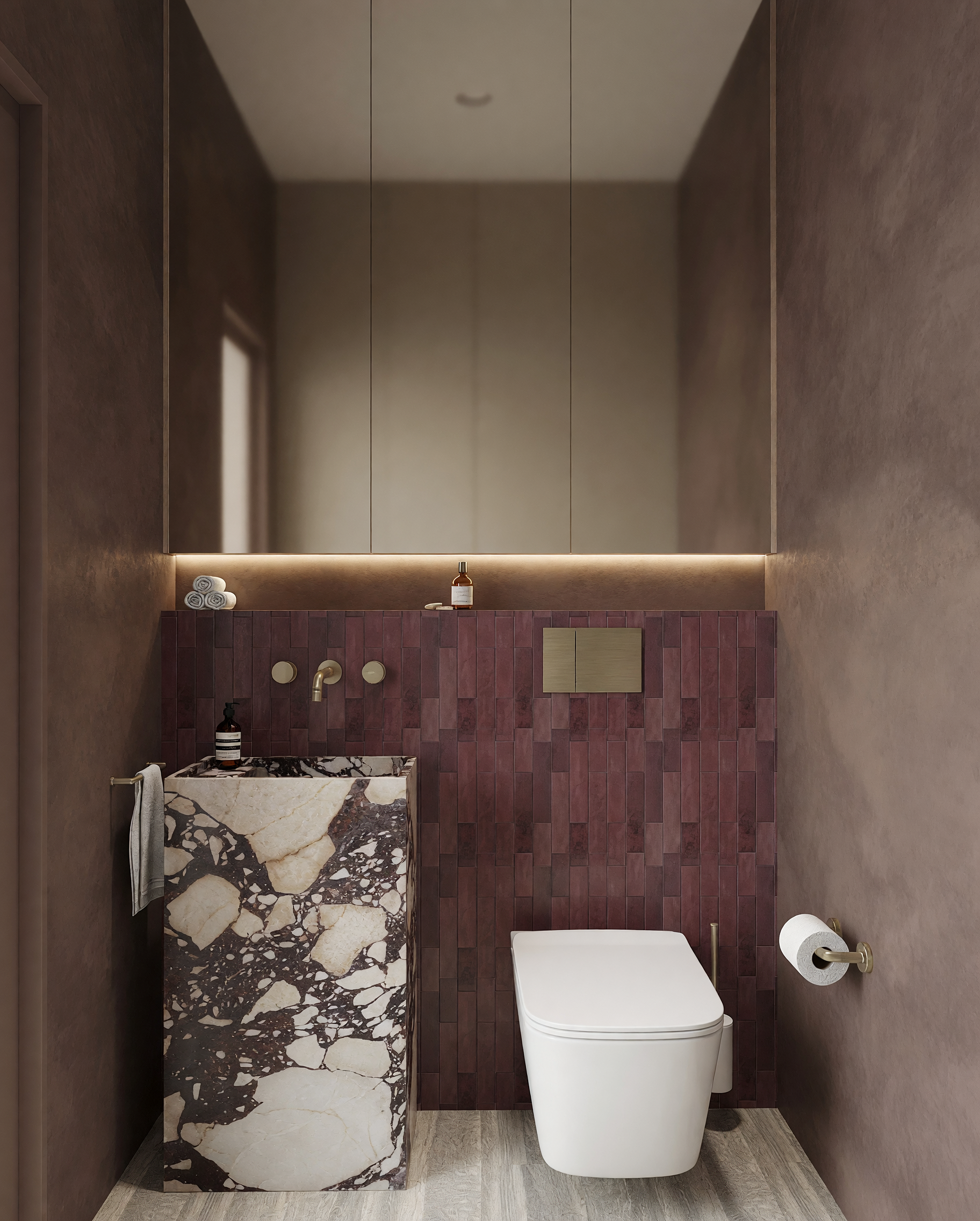 Luxury powder room with Viola stone pedestal basin, burgundy feature tiles, bronze fixtures and contemporary lighting