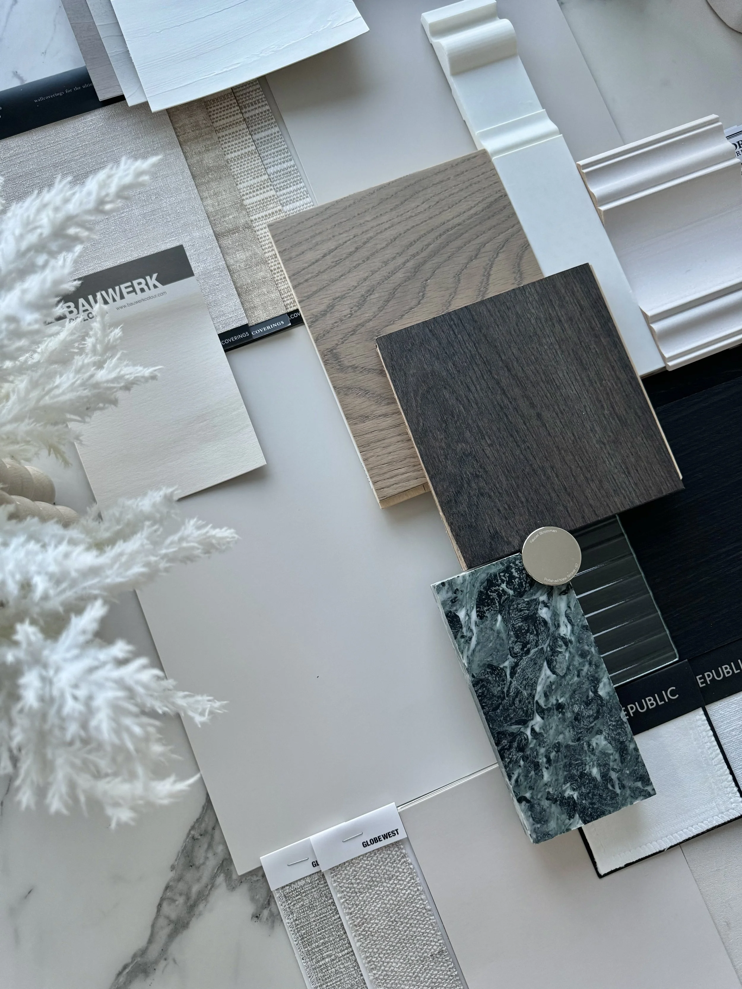 Contemporary kitchen with dramatic green marble island and dark joinery in renovated Sydney terrace - sample board