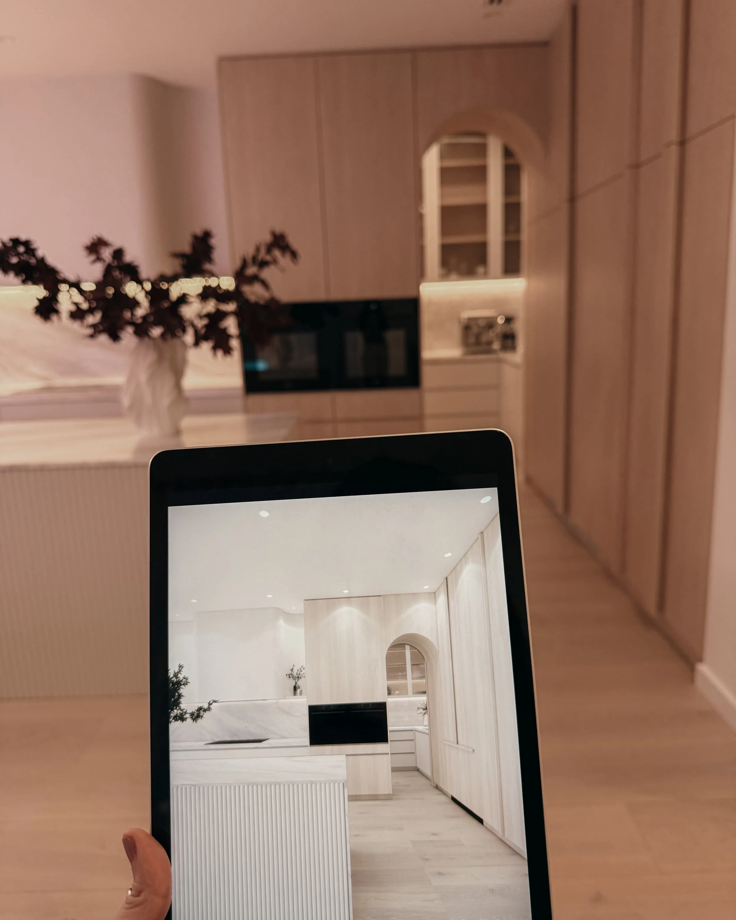 Contemporary kitchen with arched pantry entry and fluted island. New-build in Melbourne. TID Studio interior design in Sydney