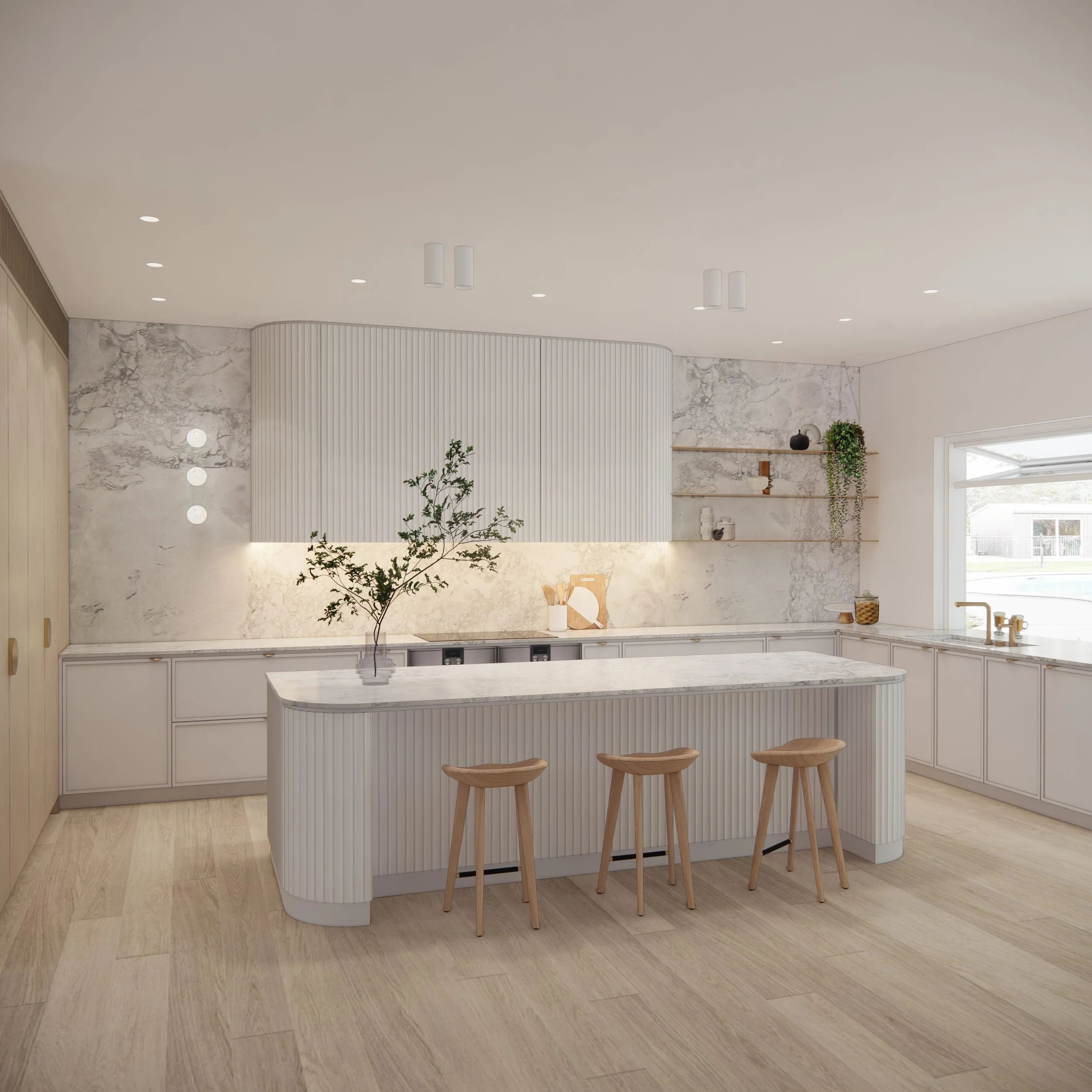 Open-plan kitchen and dining space featuring neutral palette and modern coastal design