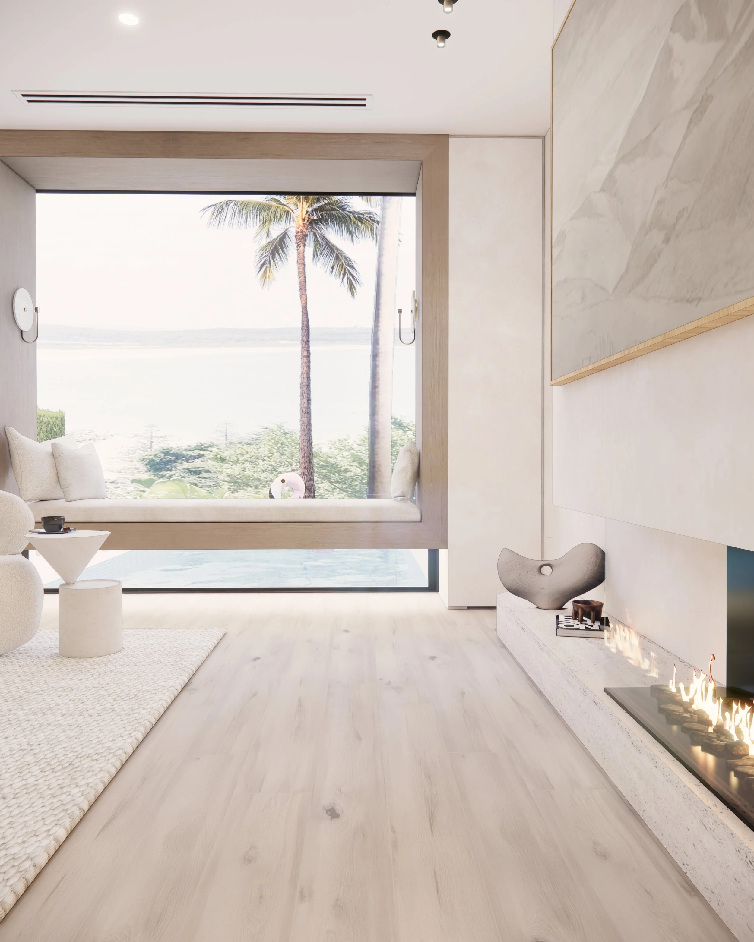 Contemporary coastal living room with curved fireplace, neutral textures, and large window seat overlooking the water — Sydney interior design by TID Studio