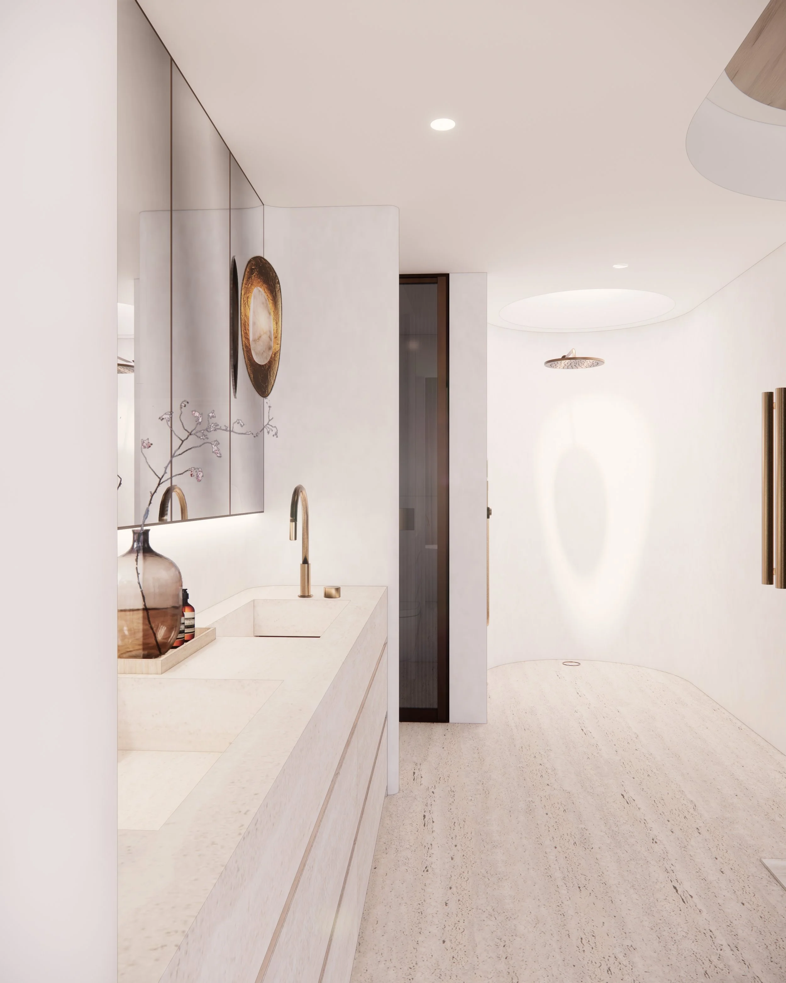 Sculptural double vanity in bold veined marble with curved detailing and brass tapware