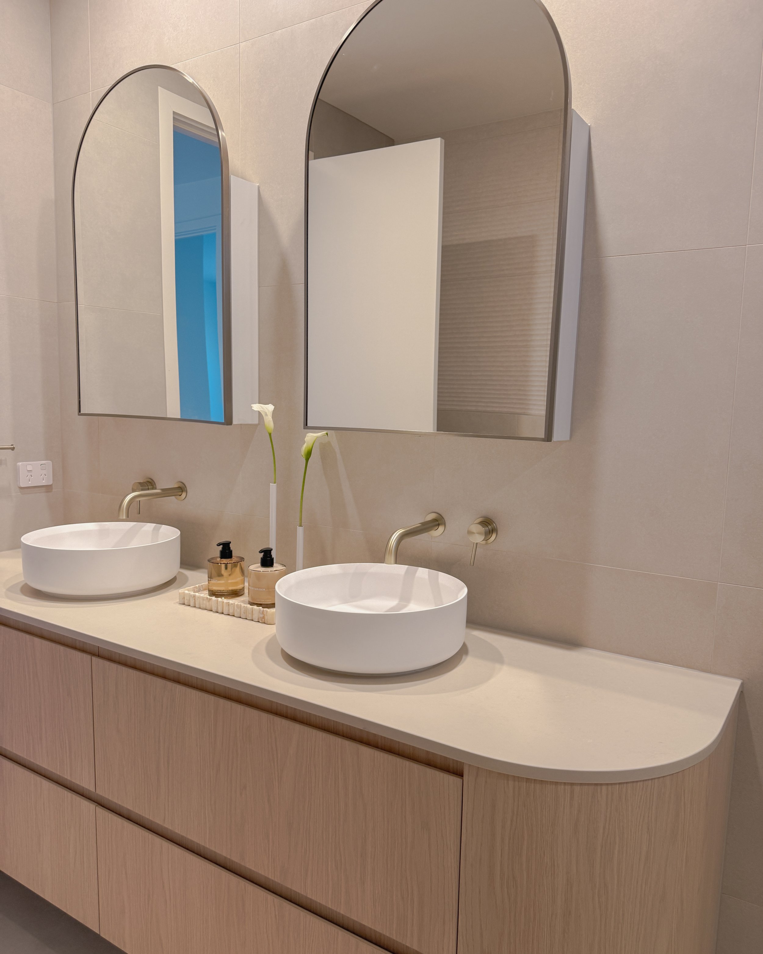 Contemporary bathroom with double vanity, enclosed shower and bathtub in Melbourne new-build. Designed by TID Studio, interior design in Sydney