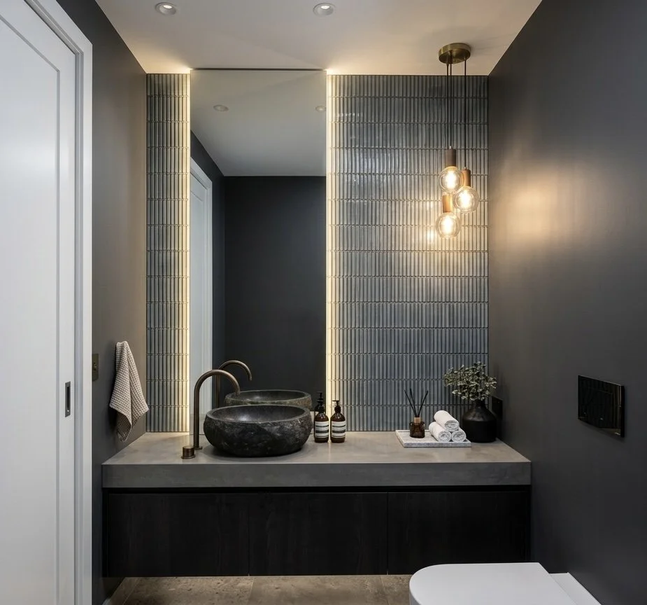 Modern masculine powder room render with stone basin, vertical feature tiles and ambient lighting — Caringbah Residence Brisbane
