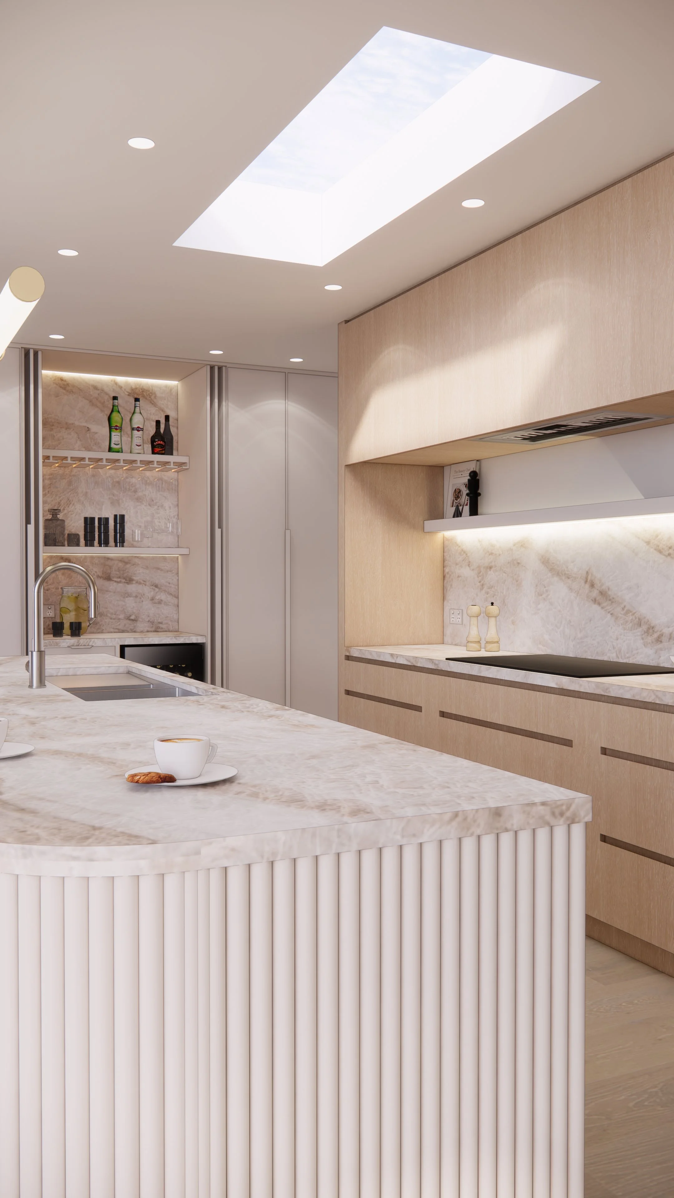 Soft neutral kitchen design featuring a fluted curved island and skylight, part of TID Studio’s Creamstone Escape project