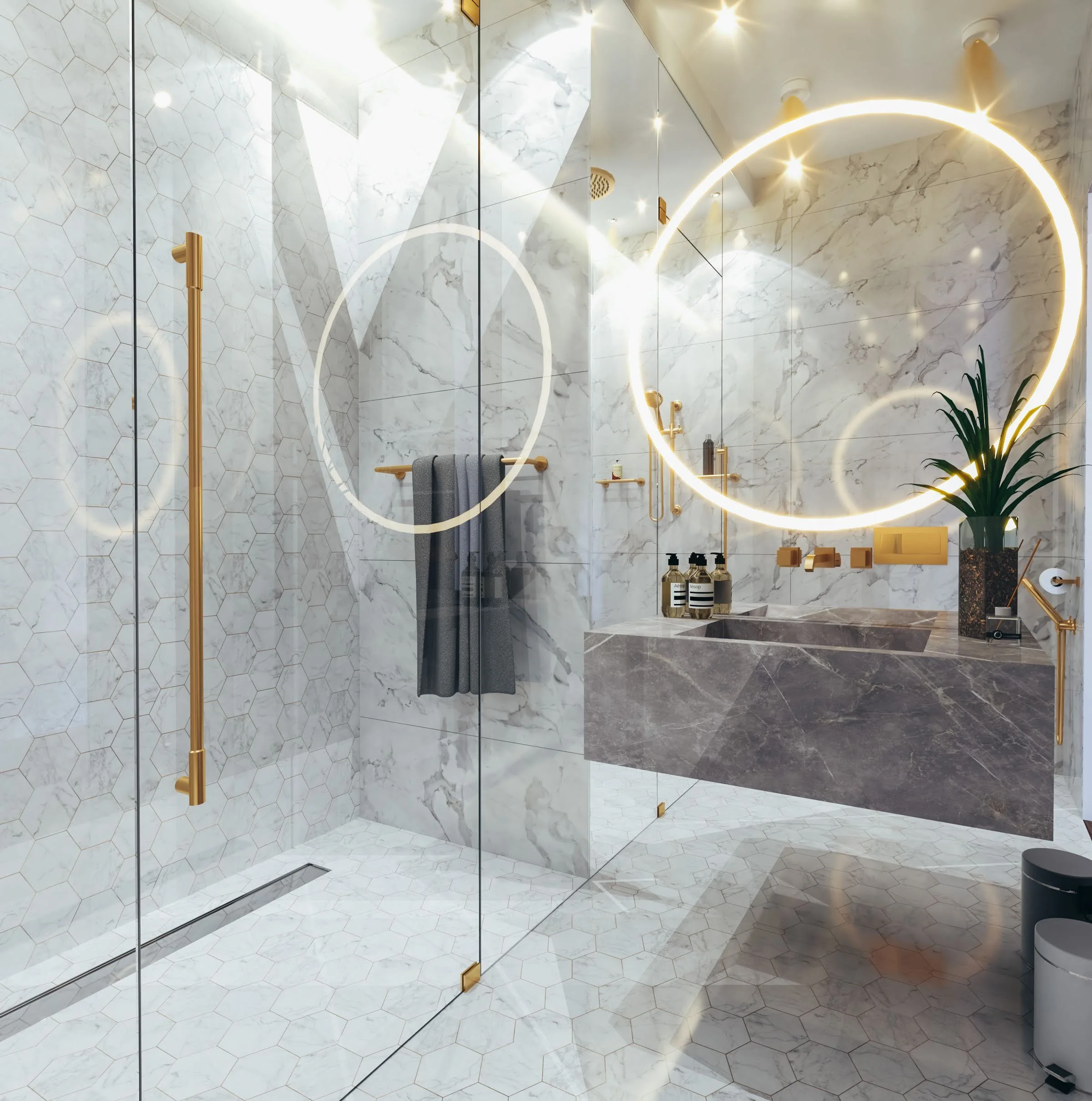 Luxurious marble shower with hexagon tiles and gold fixtures in contemporary Dubai apartment