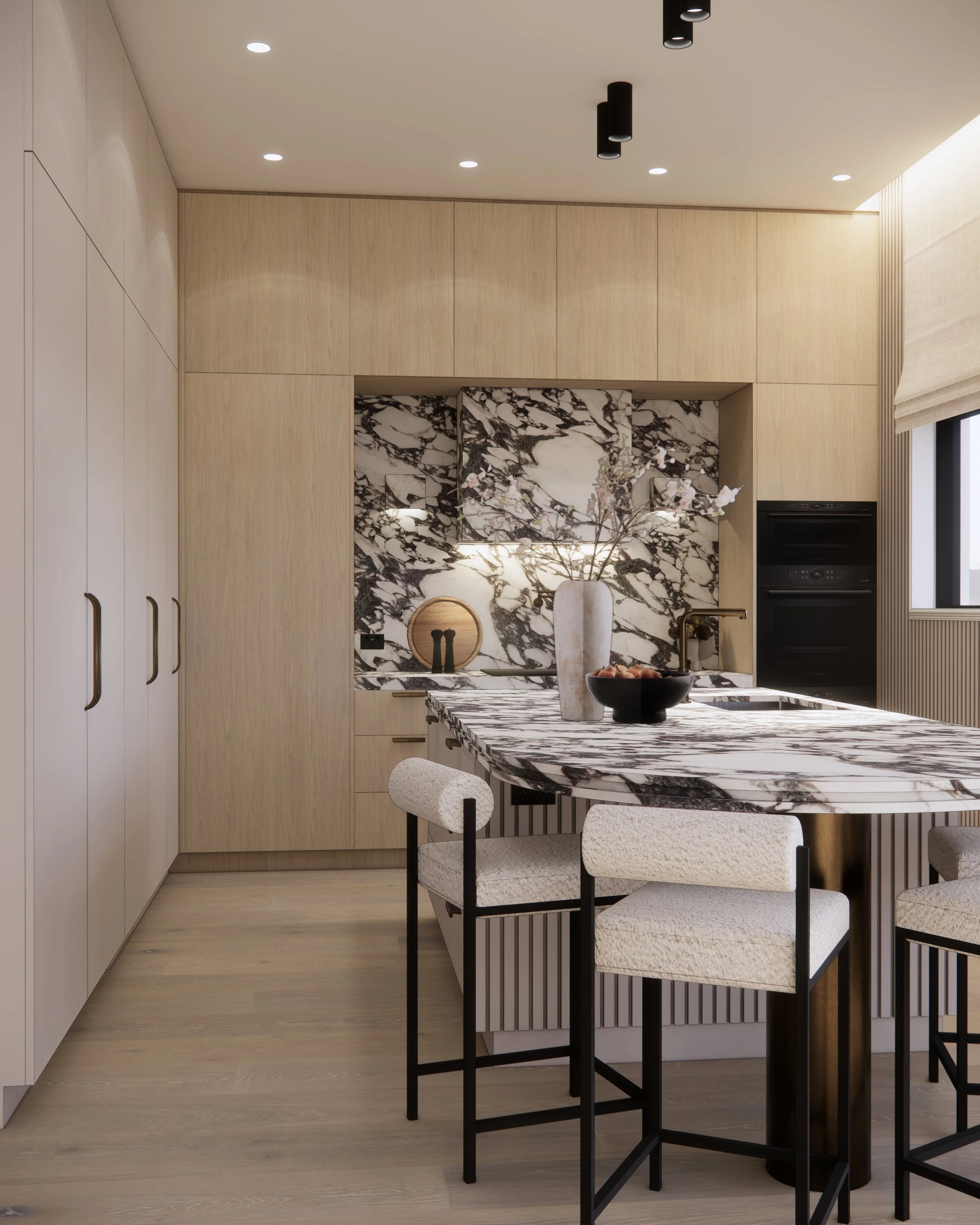 Contemporary marble kitchen with curved island and warm timber cabinetry in Melbourne house designed by TID Studio