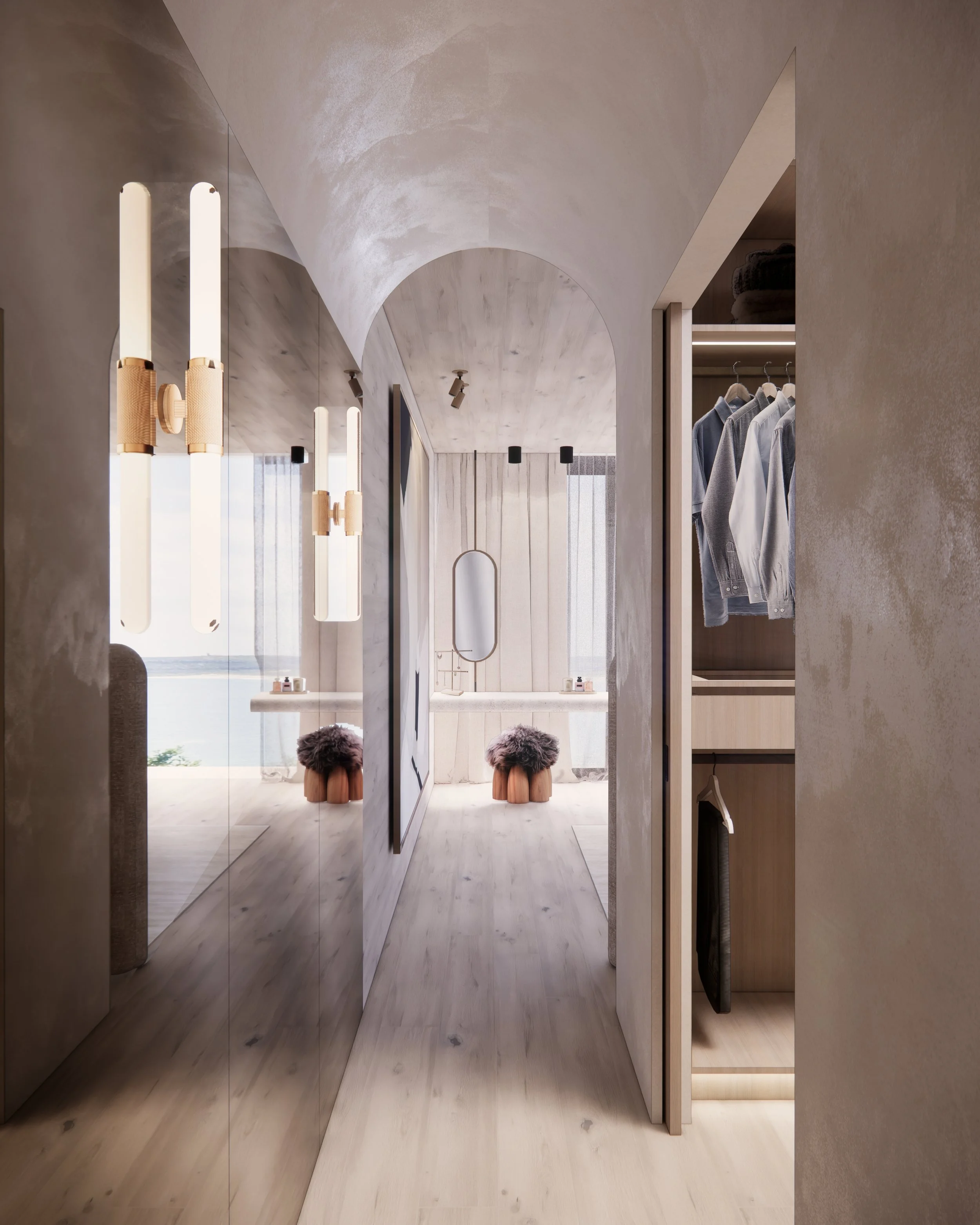Custom walk-in wardrobe with warm timber joinery, LED lighting, and a sculptural ottoman