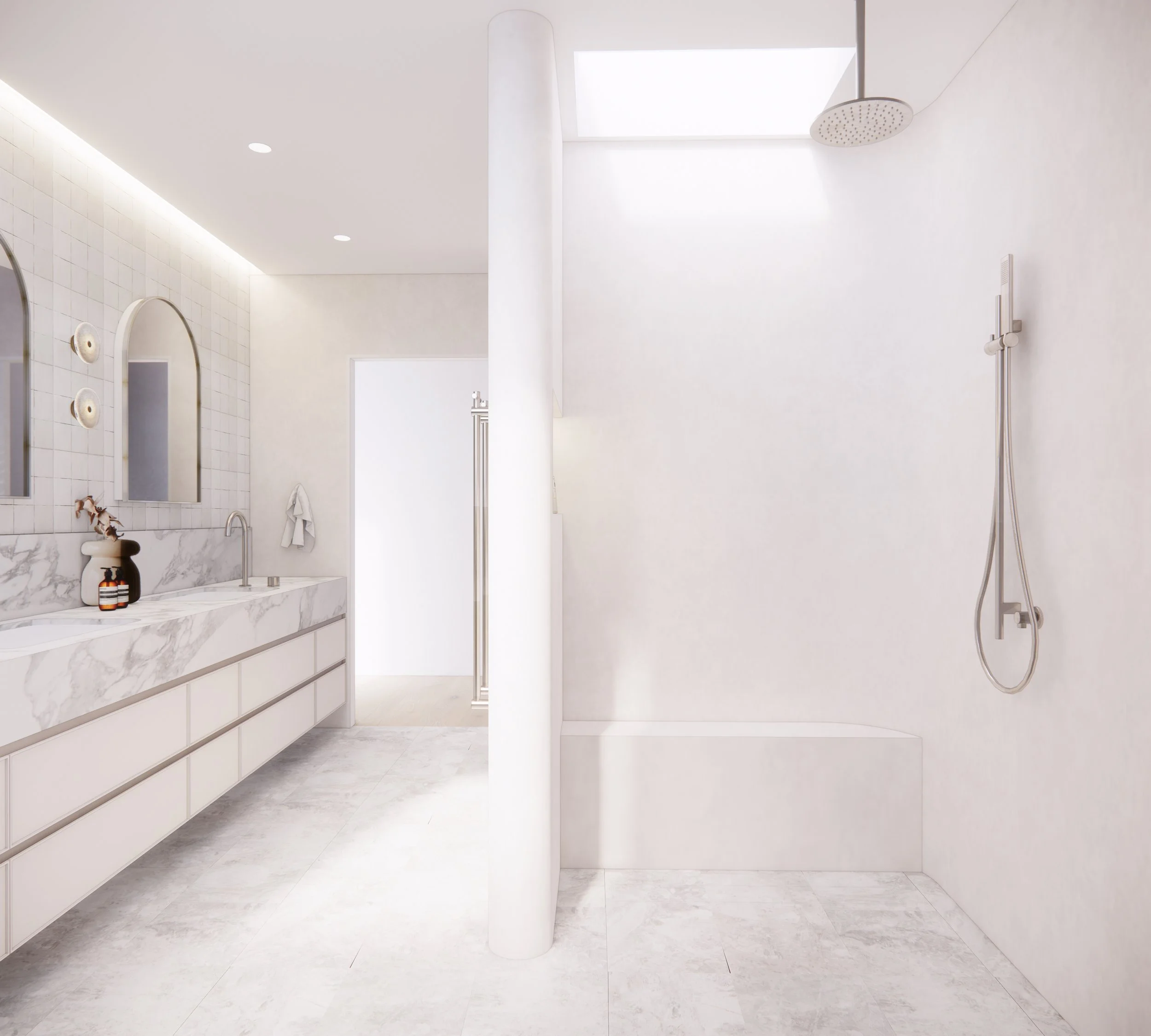 Soft minimal ensuite design in Sydney featuring a curved shower wall, brushed nickel tapware and warm neutral finishes by TID Studio