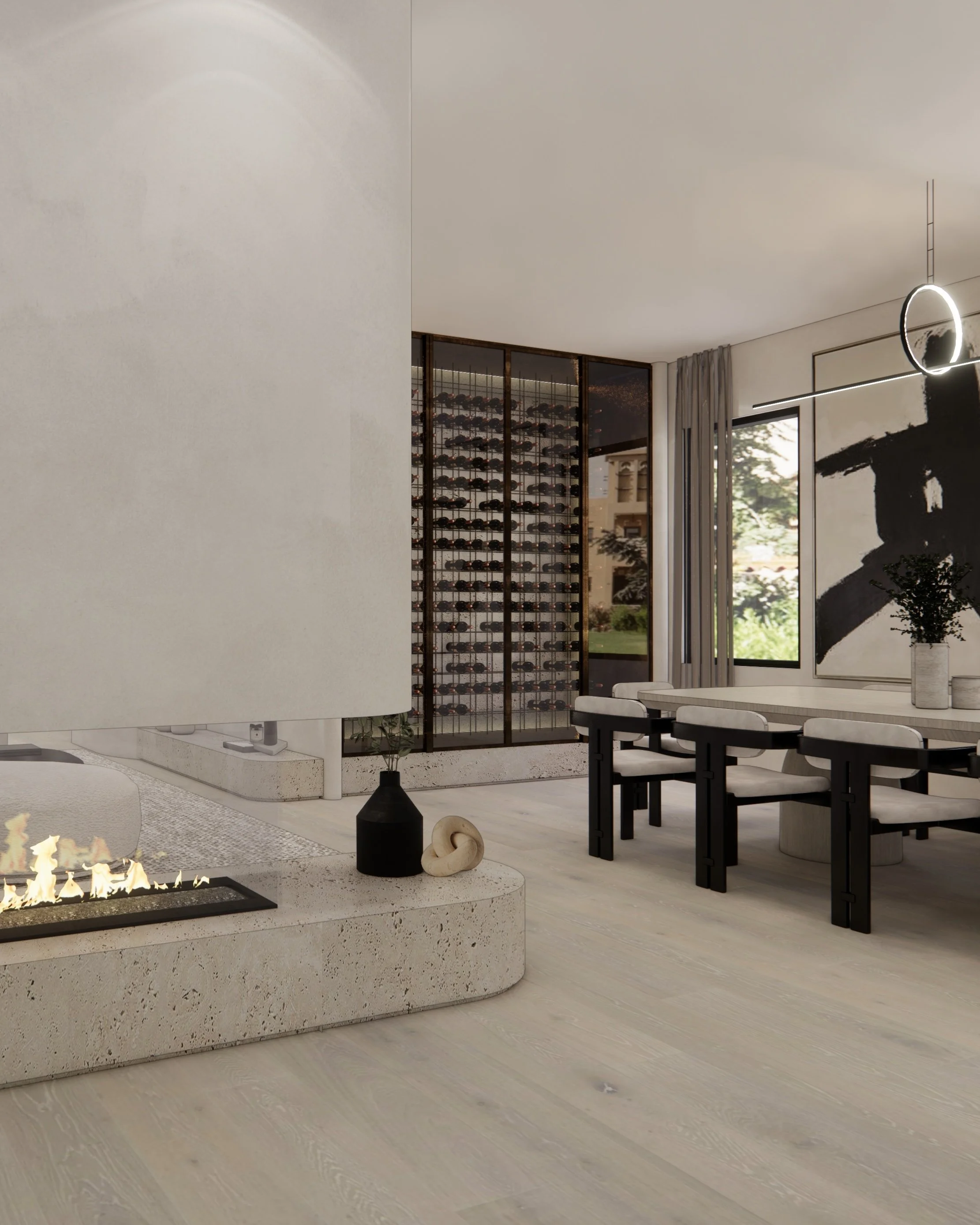 Dining area with textured travertine fireplace base and curved architectural forms