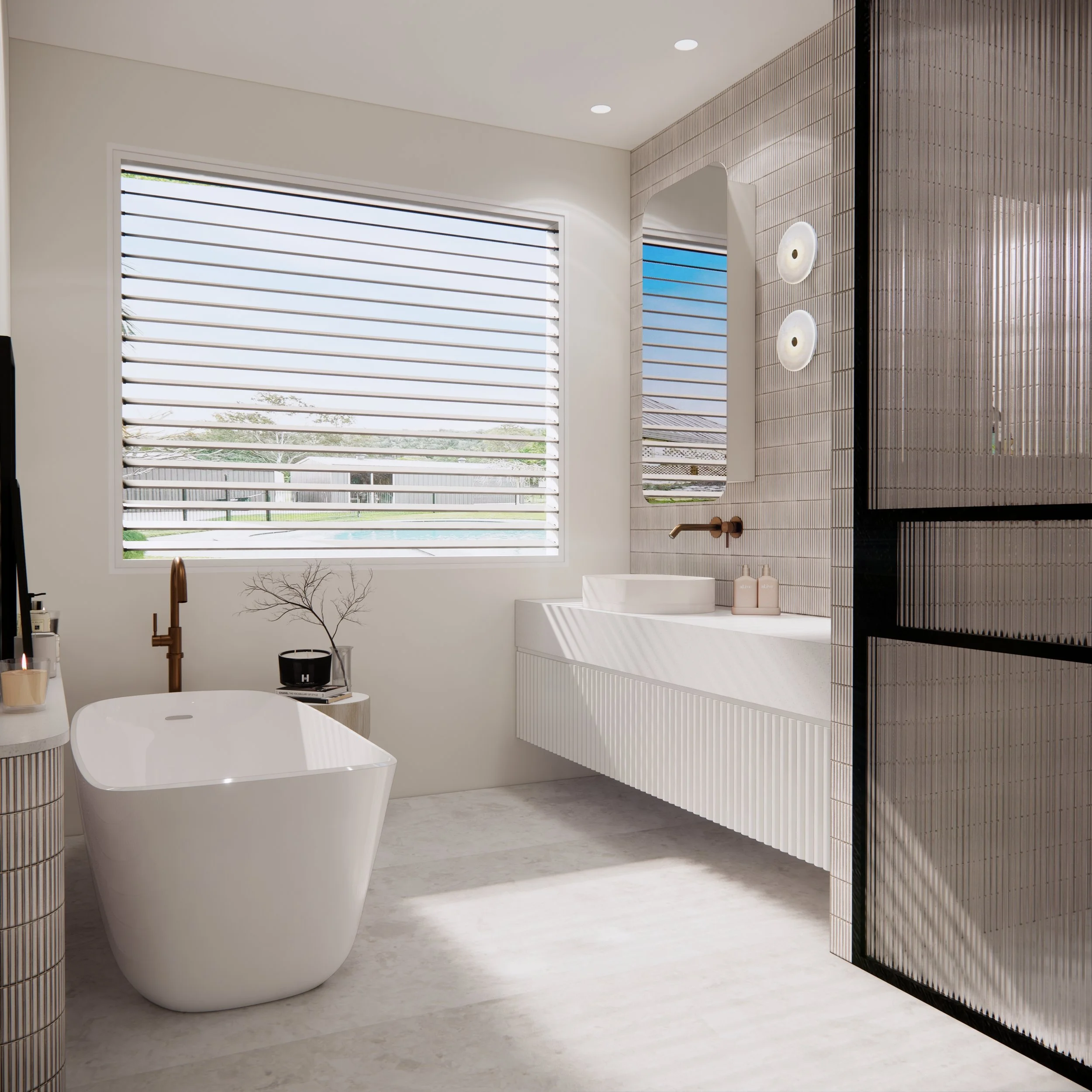 Freestanding bathtub beside louvred window in light and airy coastal bathroom design