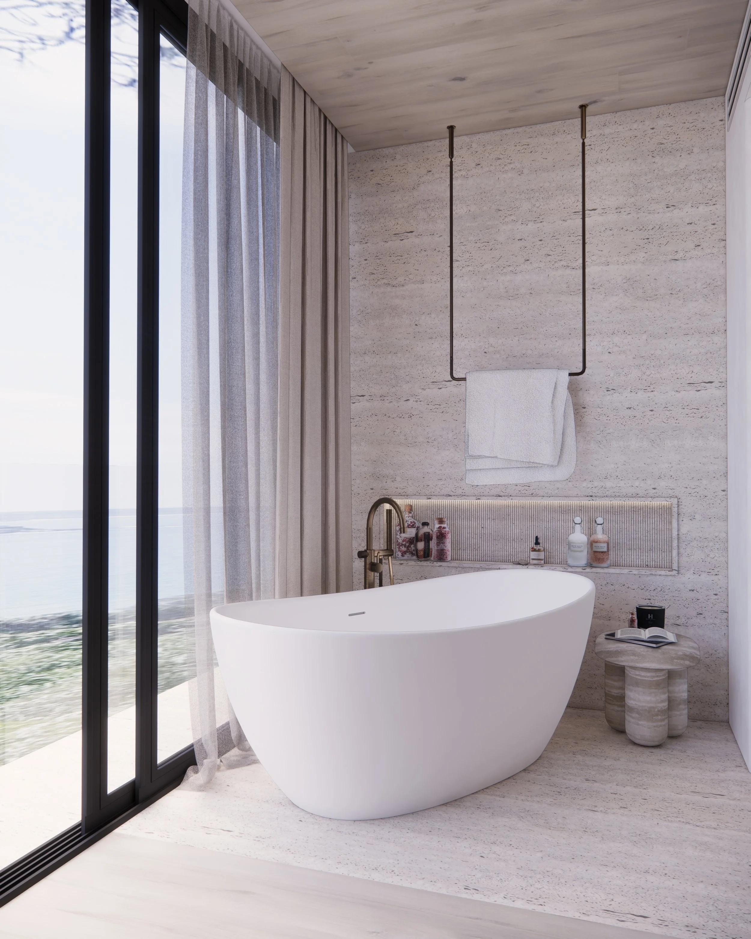 Freestanding bathtub by floor-to-ceiling windows with ocean view and travertine flooring