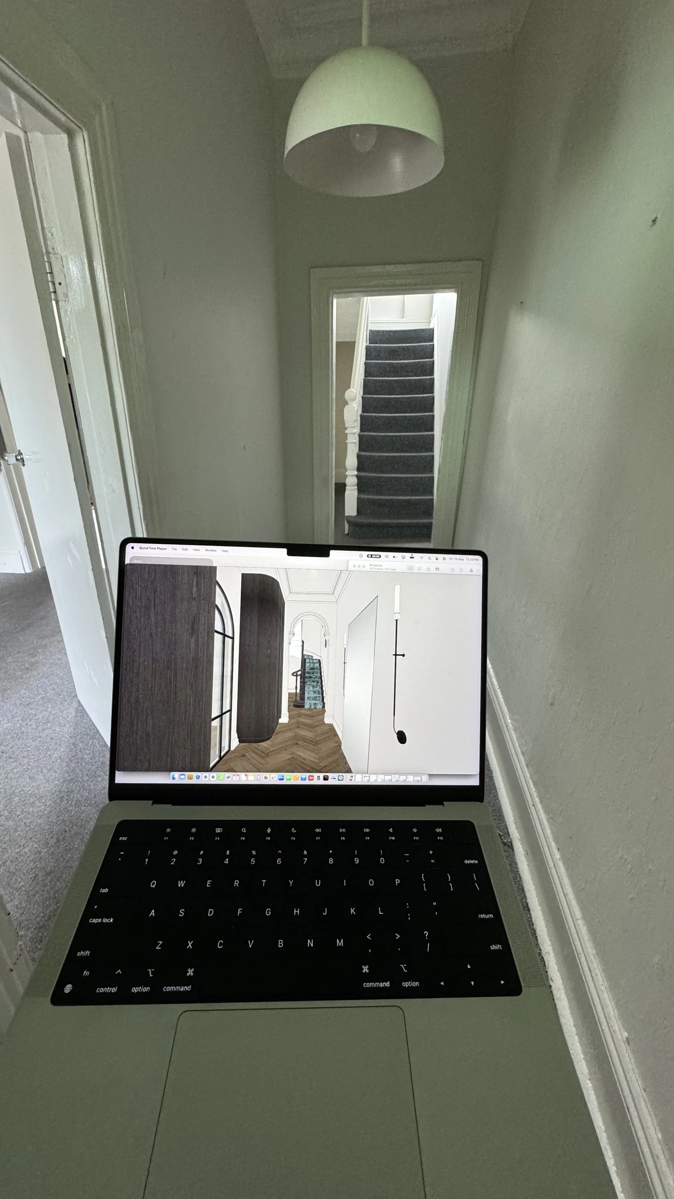 Close-up view of dark timber staircase with runner in renovated heritage terrace