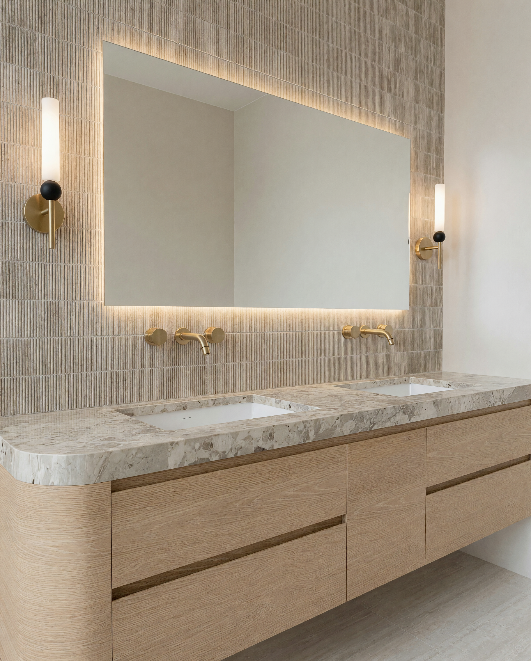Modern bathroom with double vanity, shower, built-in bathtub, bronze fixtures and contemporary lighting, designed by TID Studio