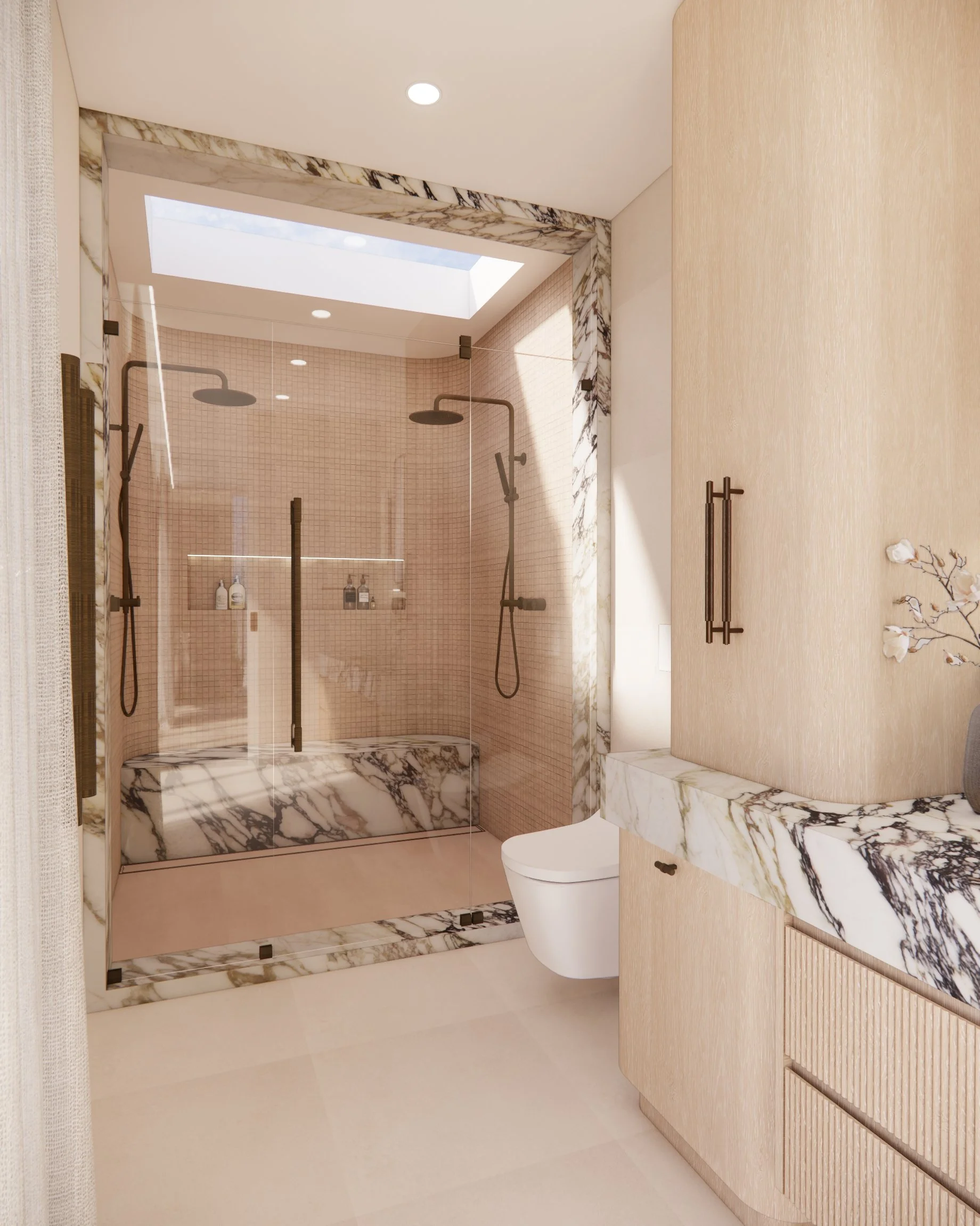 Luxury primary bathroom with carved marble vanity, double shower, and warm minimal finishes in Sydney