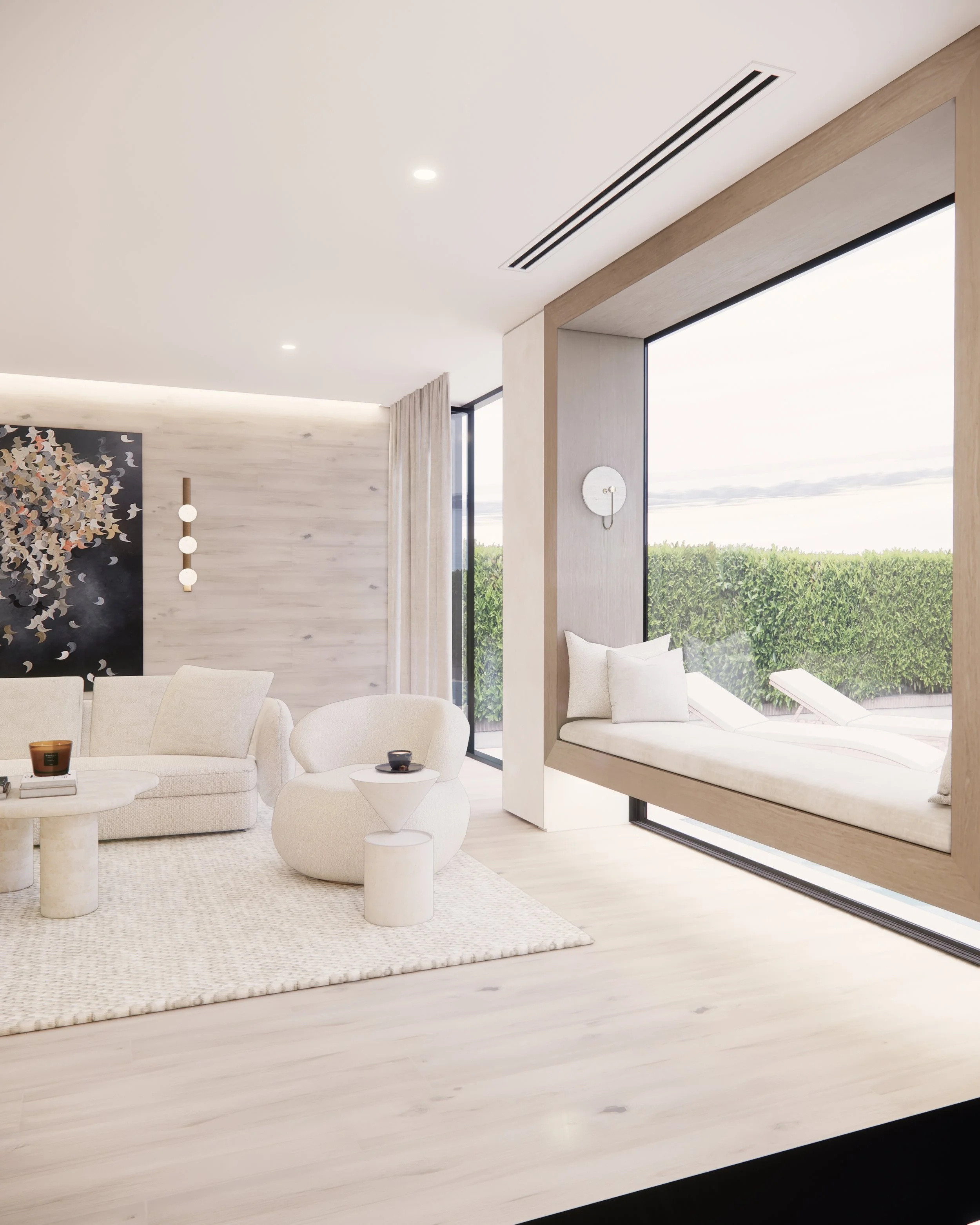 Contemporary coastal living room with curved fireplace, neutral textures, and large window seat overlooking the water — Sydney interior design by TID Studio