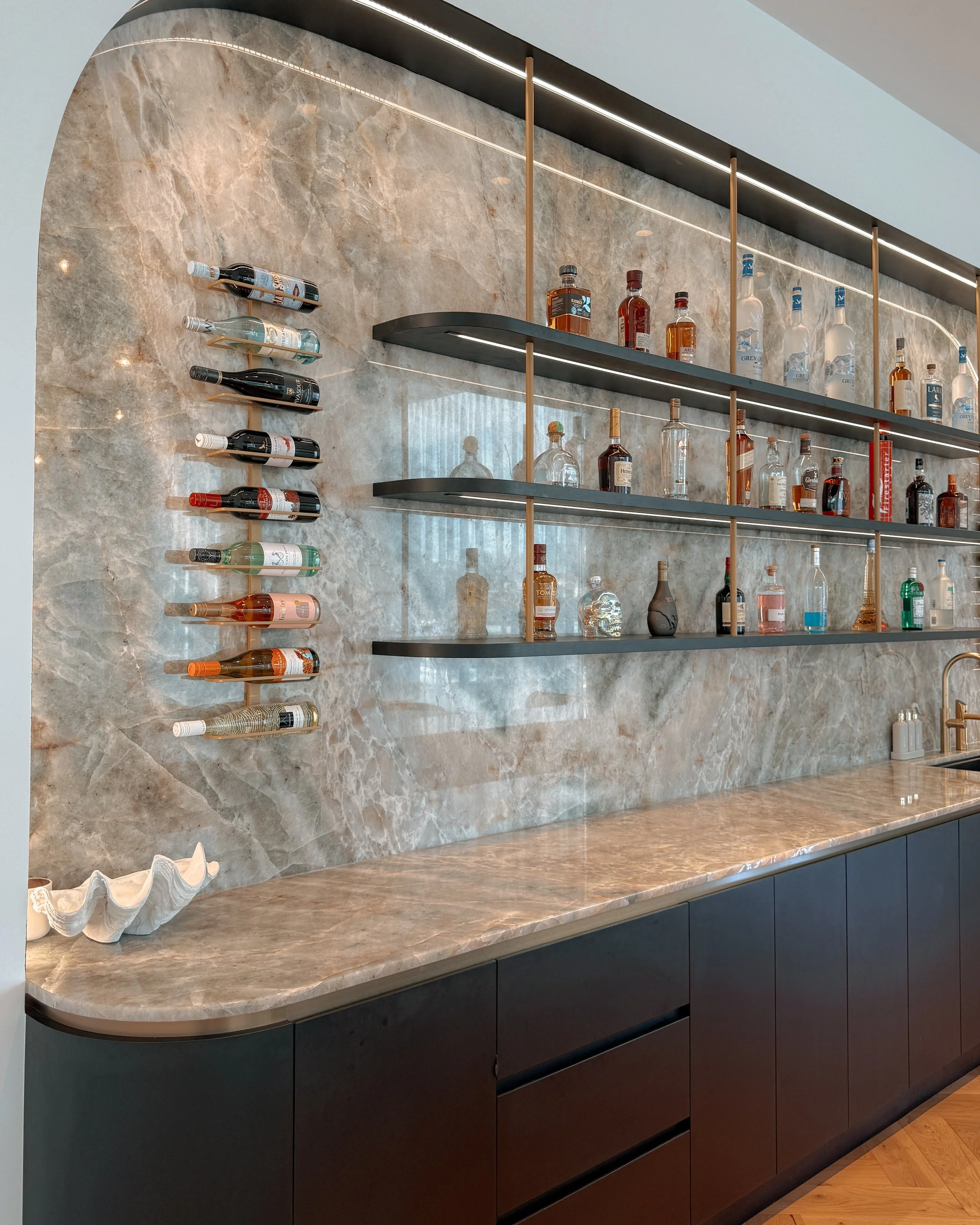 Modern coastal bar with island booth seating in a pool house in Brisbane, designed by TID Studio Sydney
