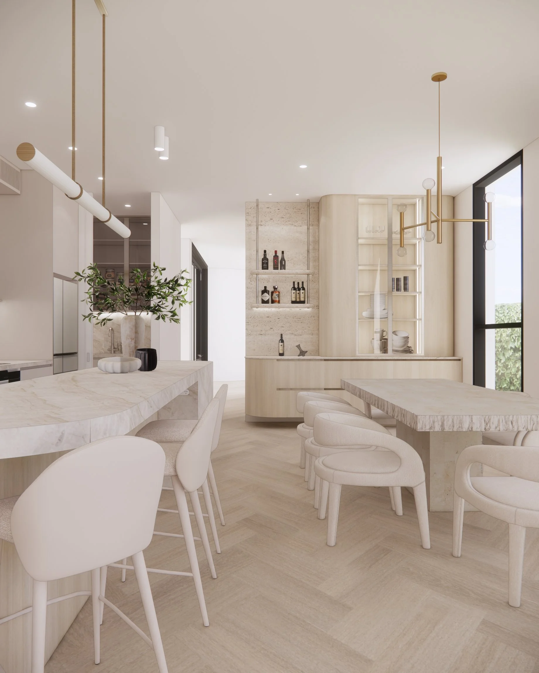 Open-plan kitchen and dining space featuring sculptural lighting, creamy stone, and soft timber flooring