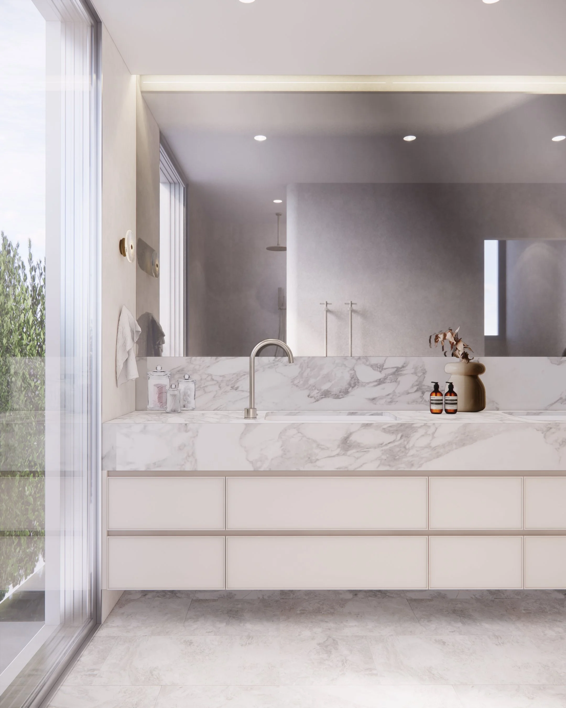 Elegant double vanity in natural stone with soft lighting and neutral detailing, part of the Creamstone Escape home renovation by TID Studio