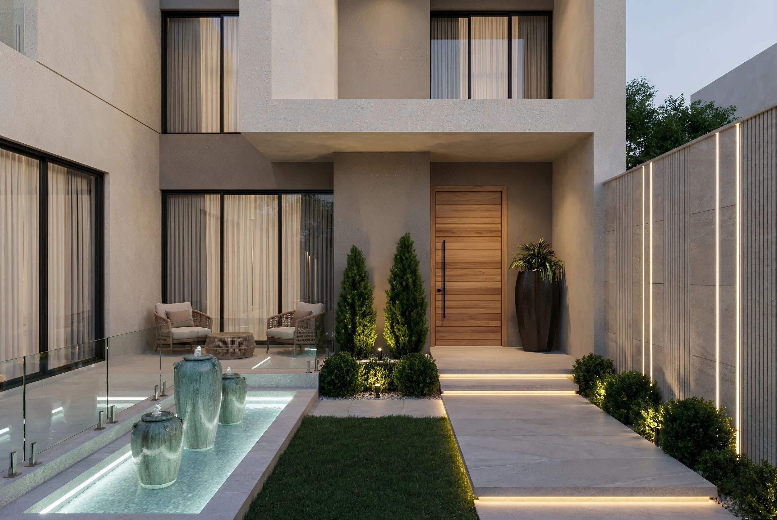 Modern house entrance with stairs, large potted plants, outdoor seating area with chairs and a table, decorative water feature with large ceramic vases, landscaped garden with shrubs and trees, and illuminated pathway lighting at dusk.