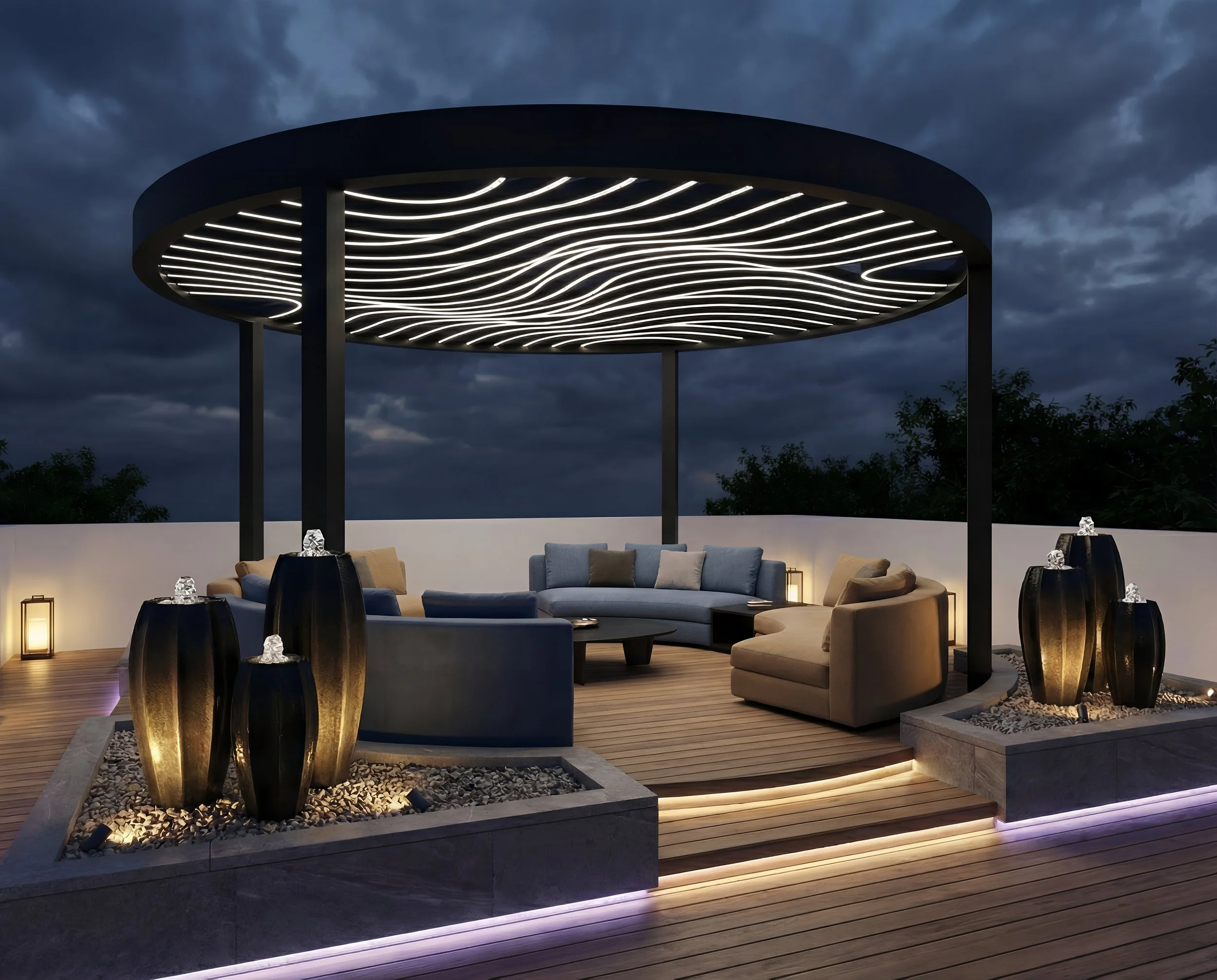 An elegant outdoor rooftop lounge area with modern furniture, decorative vases, and ambient lighting under a circular canopy with wave-patterned light fixtures against a dark cloudy sky.