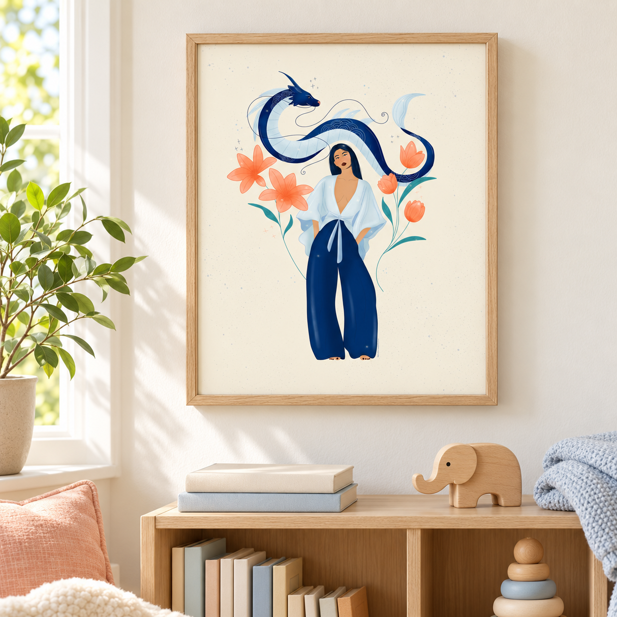 Light oak framed art in a reading nook.png