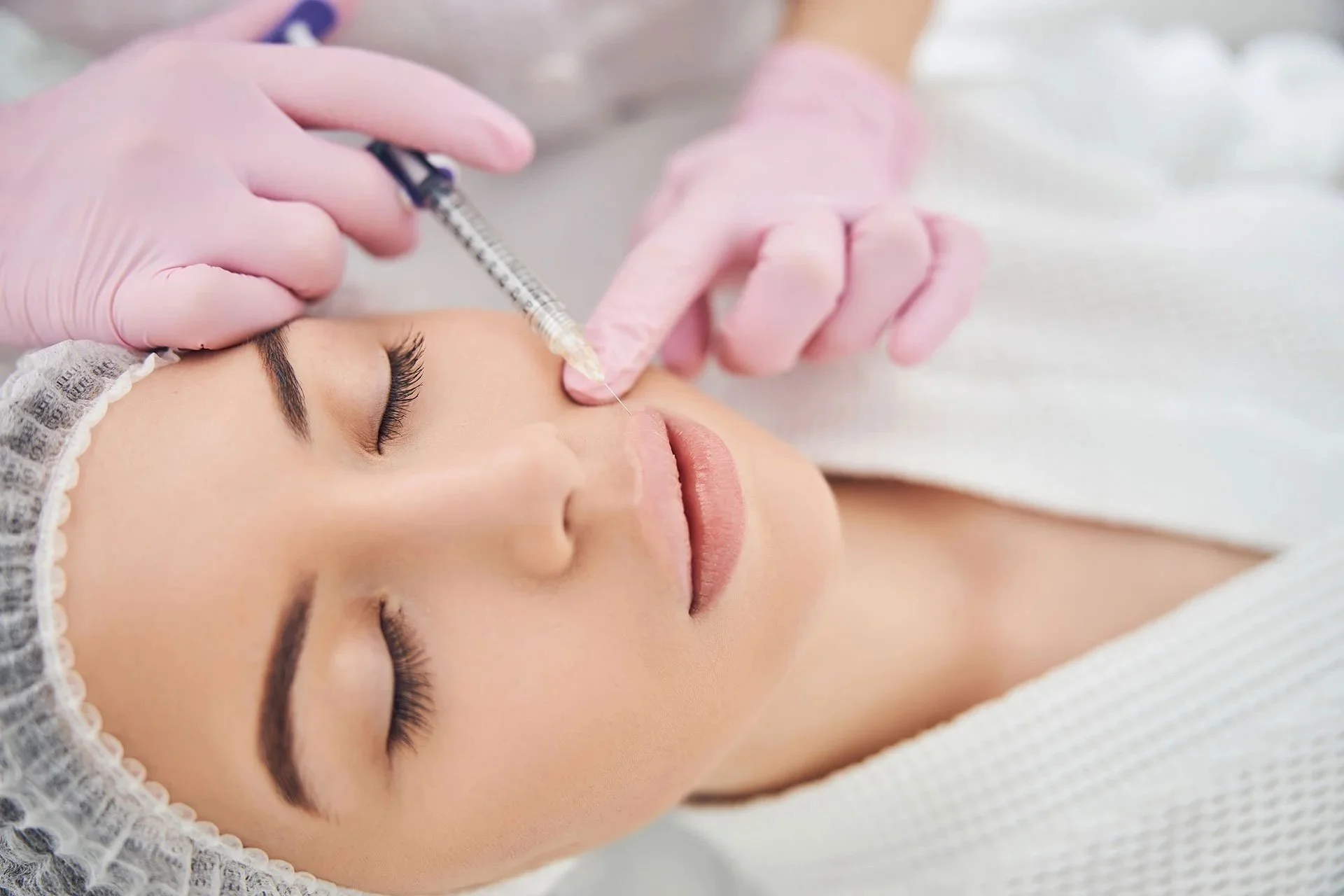 Woman having dermal filler treatment Staffordshire