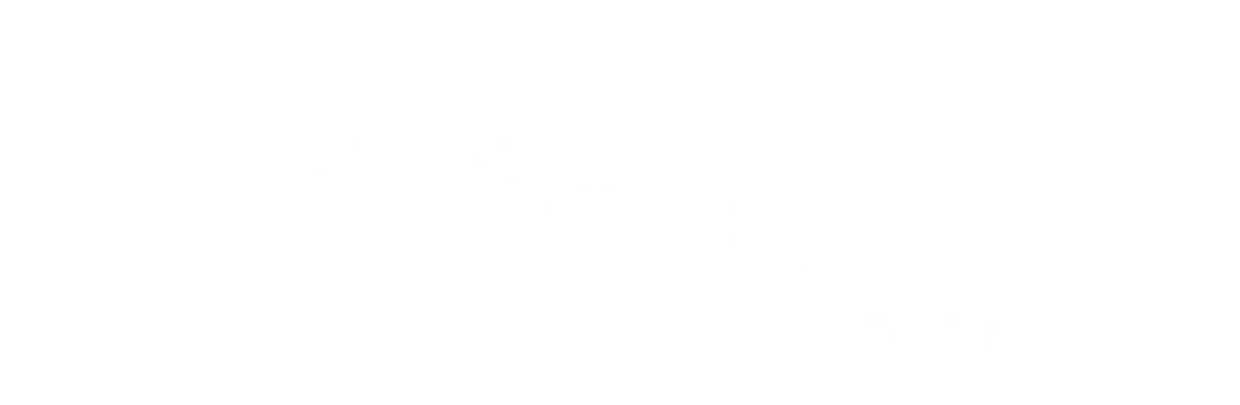 Text that reads 'Not enough of a HUMAN' on a black background with white, uneven, and slightly distressed font.