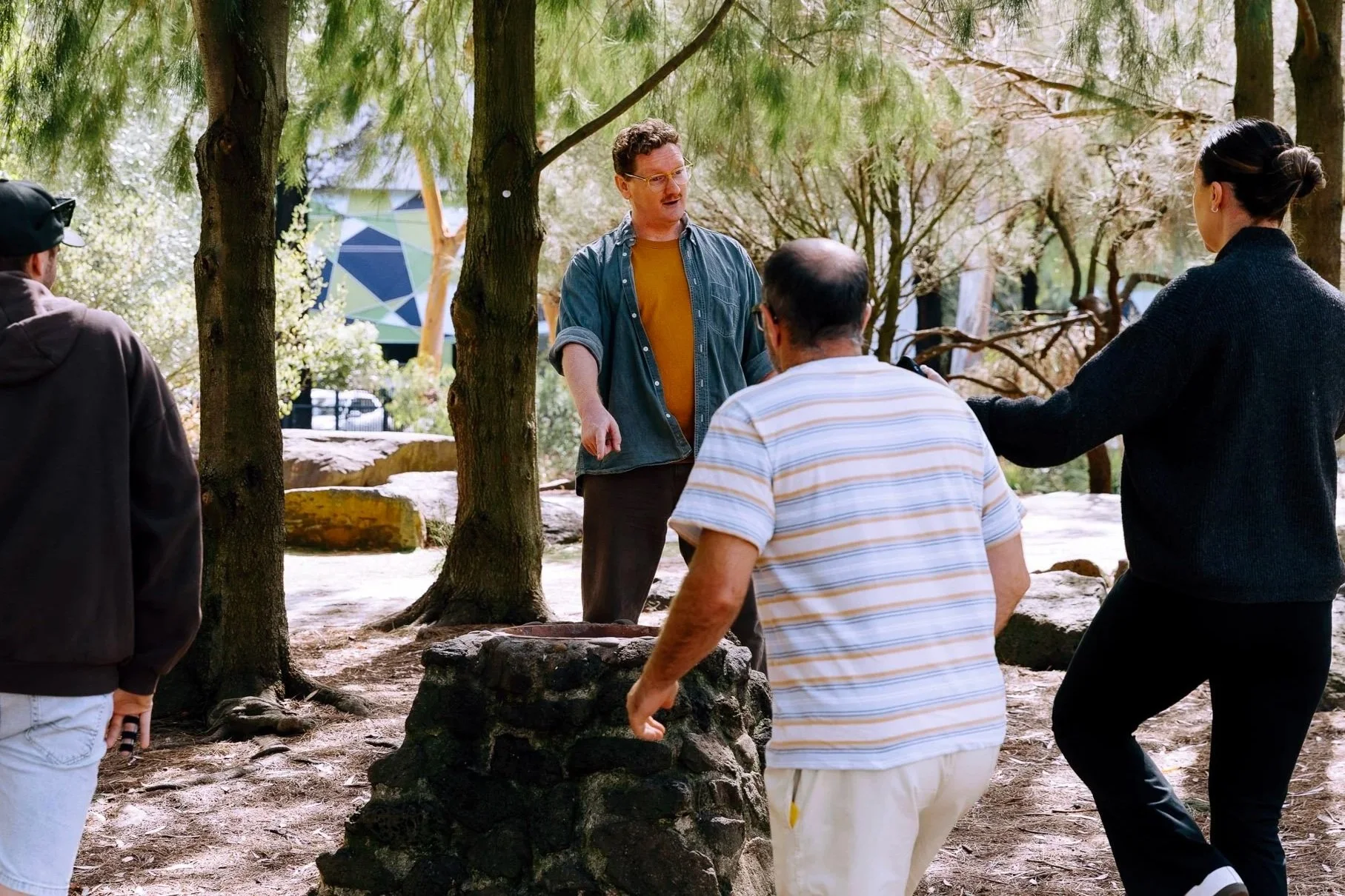 Simon Conlon facilitating a group of teachers outside