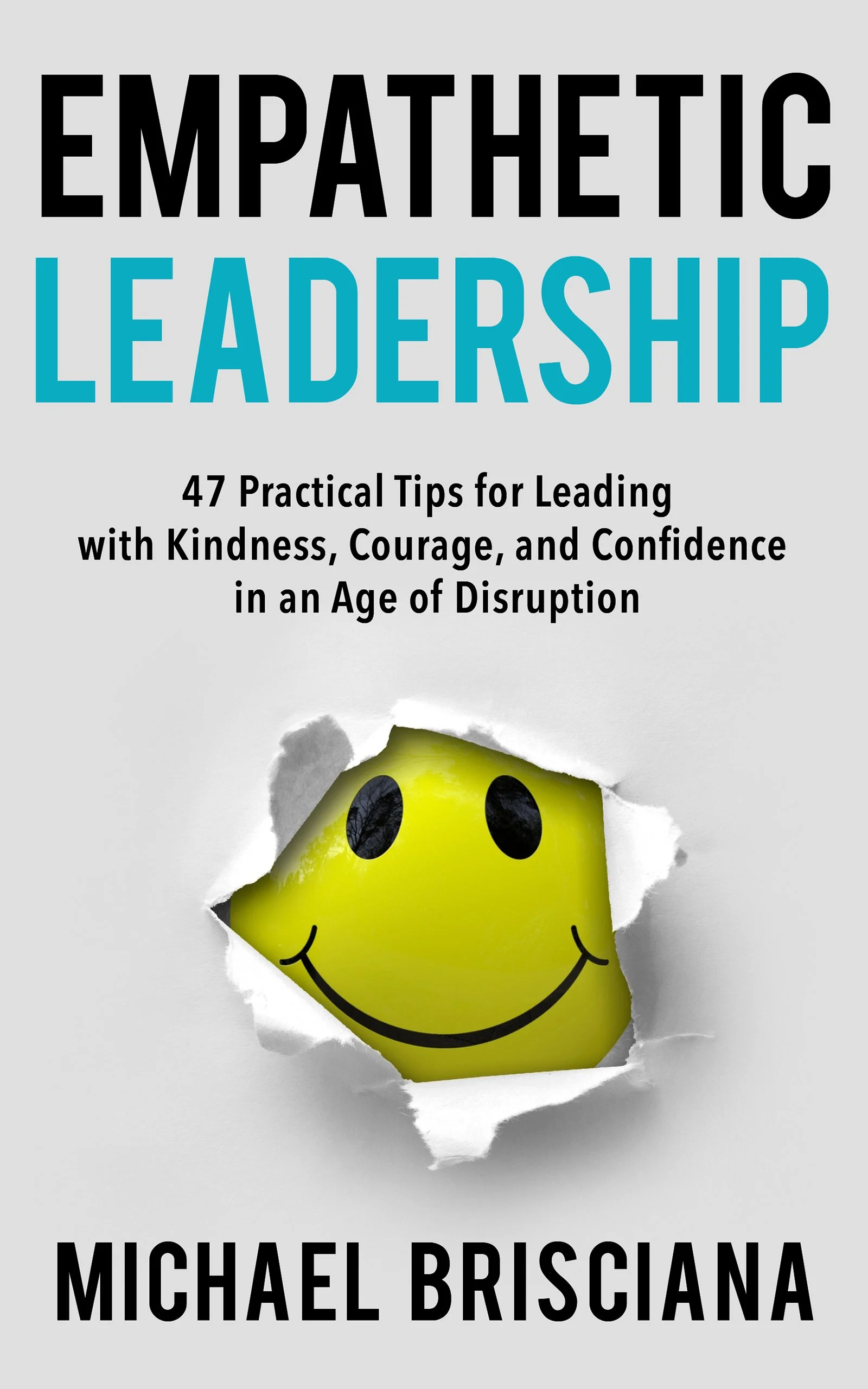 Book cover titled "Empathetic Leadership: 47 Practical Tips for Leading with Kindness, Courage, and Confidence in an Age of Disruption" by Michael Brisciana. The cover features a smiling yellow emoji face peeking through a torn hole in a gray background.