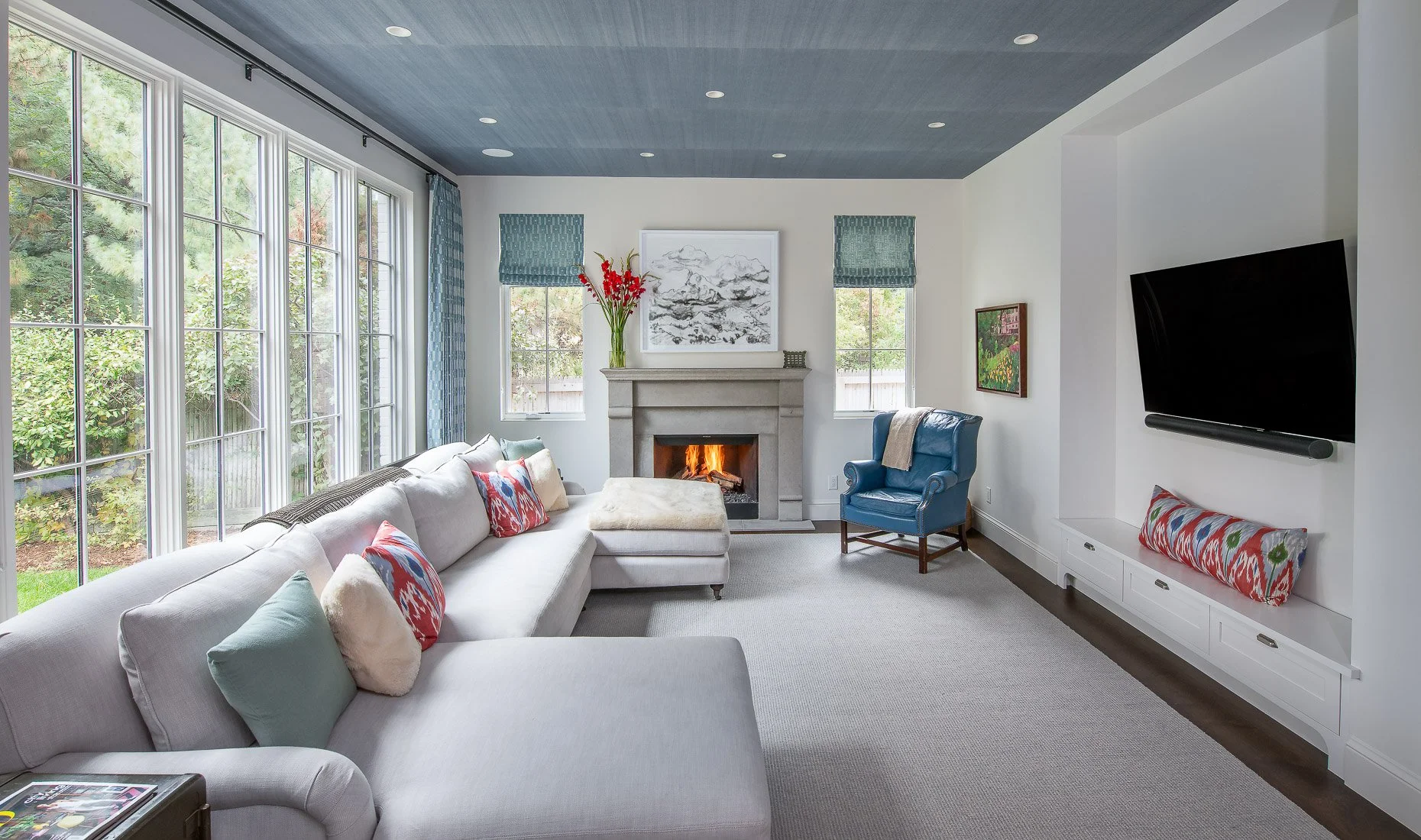 Soft Redesign for a sophisticated family room with amazing ceiling accents