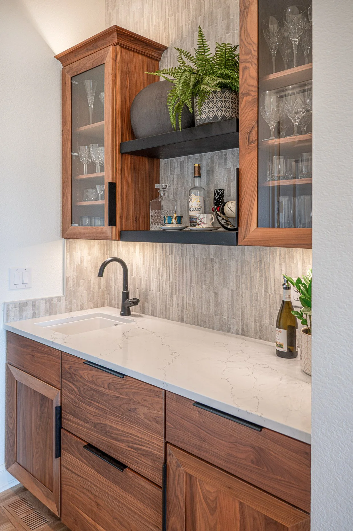 Butler's Pantry design with gorgeous backsplash and walnut cabinetry