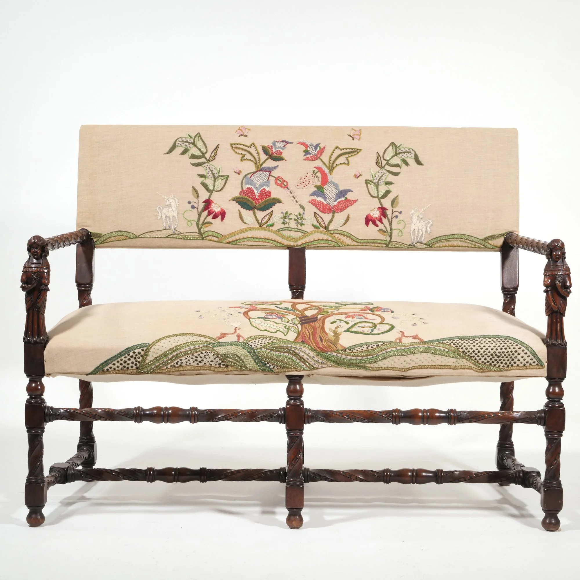 A CARVED JACOBEAN SETTEE | Hammer: $3,000