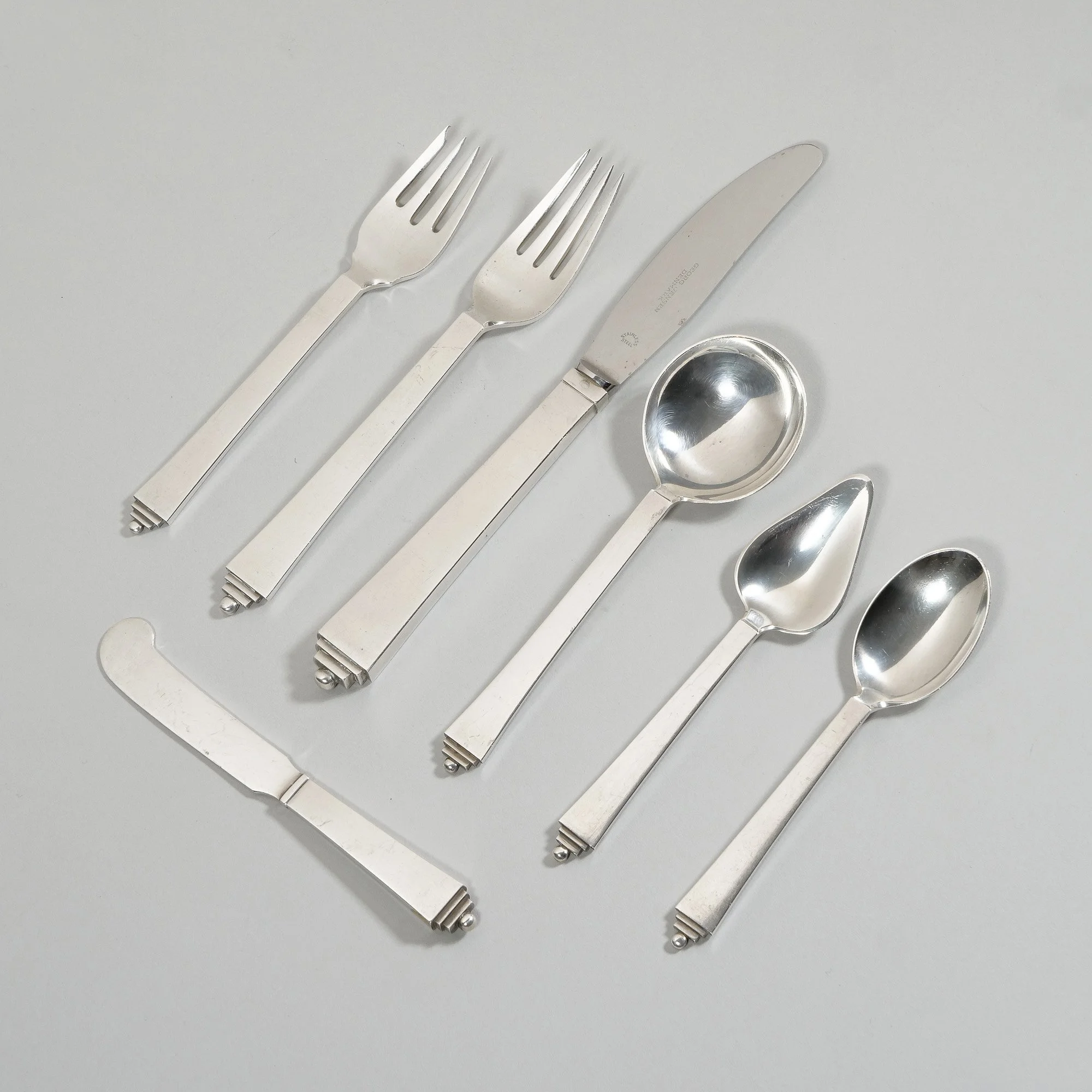 GEORG JENSEN PYRAMID STERLING FLATWARE | Hammer: $7,000