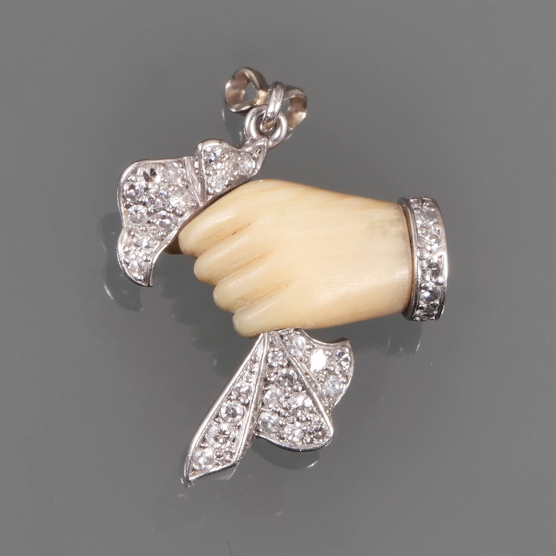 Cartier Carved Bone & Diamond Handkerchief Pendant  $2,700 