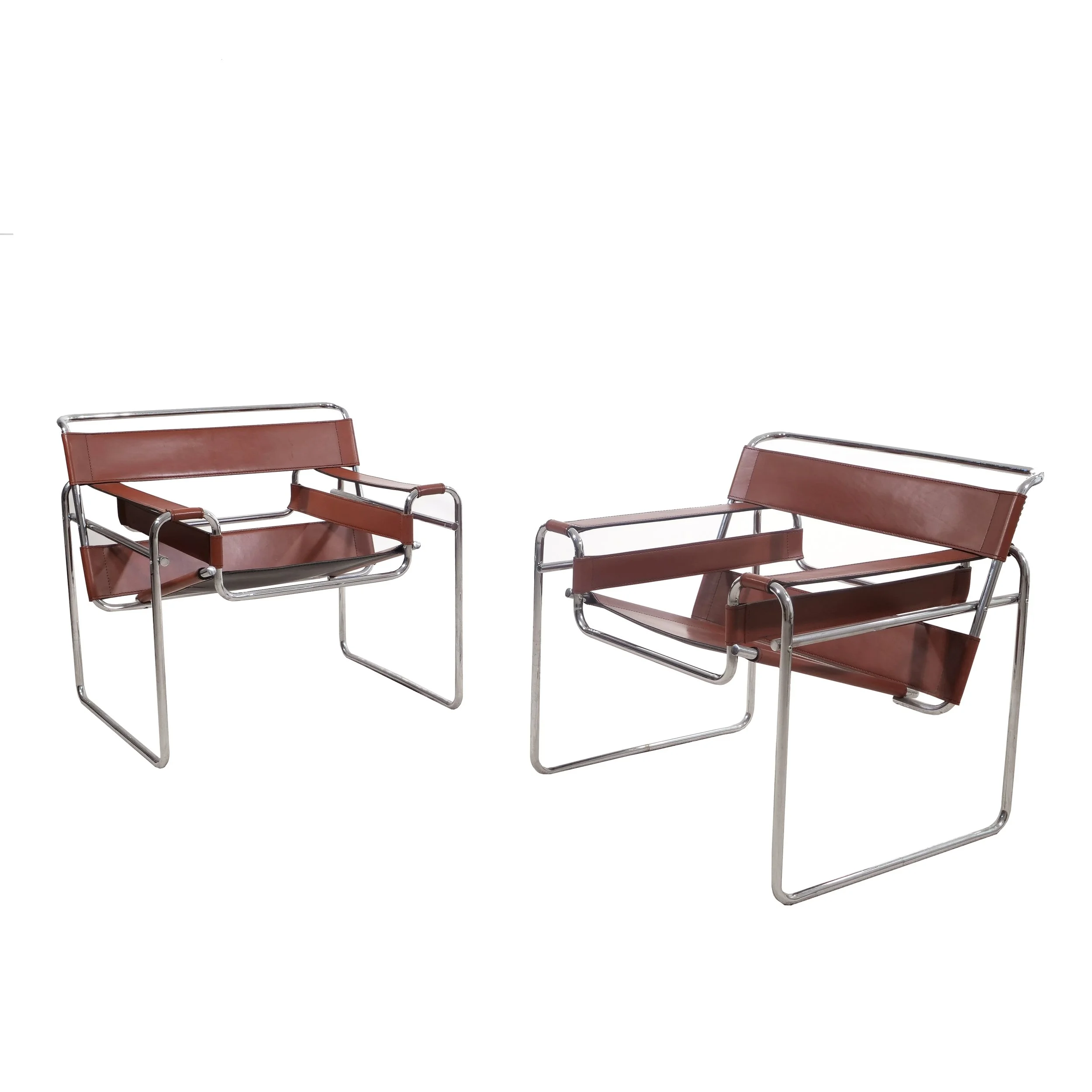 PAIR WASSILY SLUNG LEATHER ARMCHAIRS