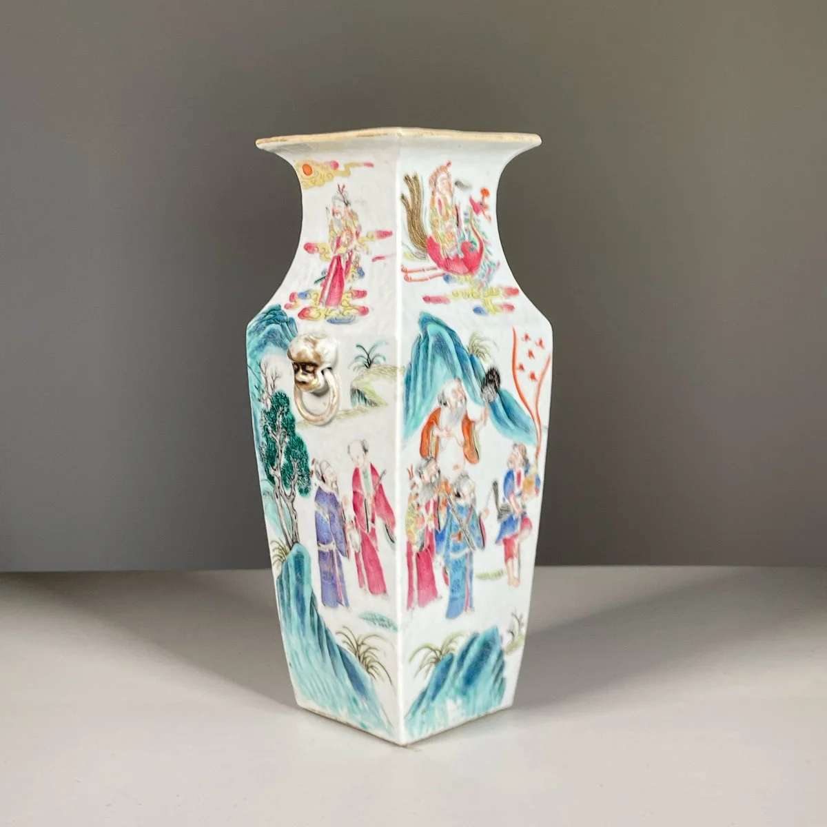A Chinese porcelain vase with colorful traditional Asian artwork and a small shaped handle, auctioned and photographed by ACES Gallery.