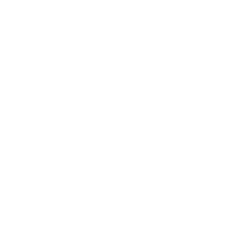 A black and white compass with a mountain peak in the center.