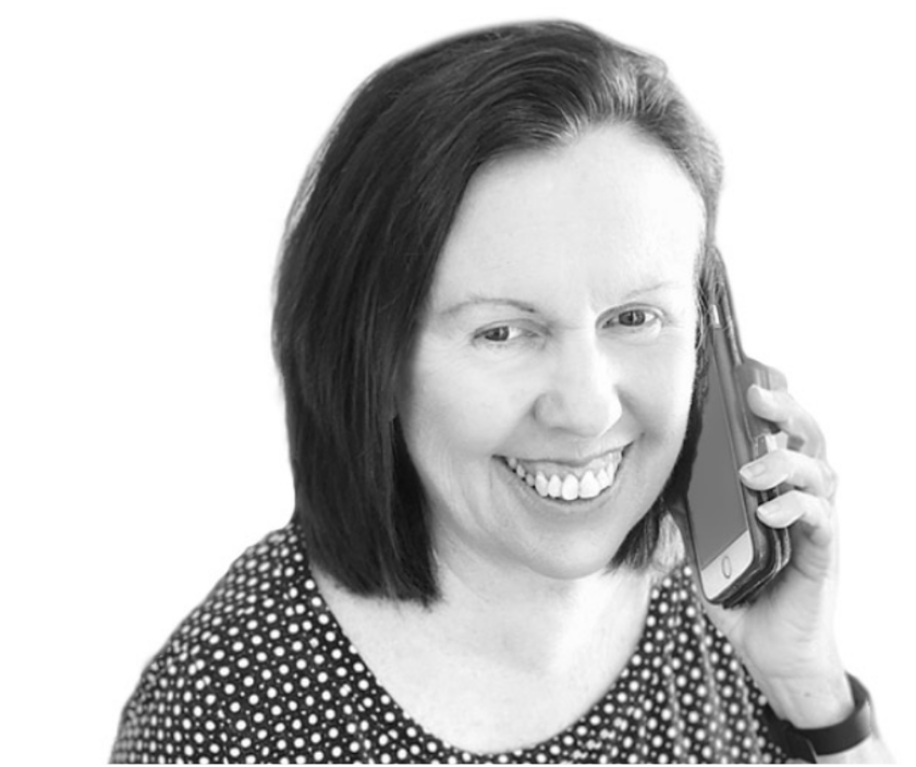 udy Benevides, PTIX Operations Manager, smiling on a phone call and recognized for her responsive, hands-on support that helps event organizers manage logistics and operations smoothly