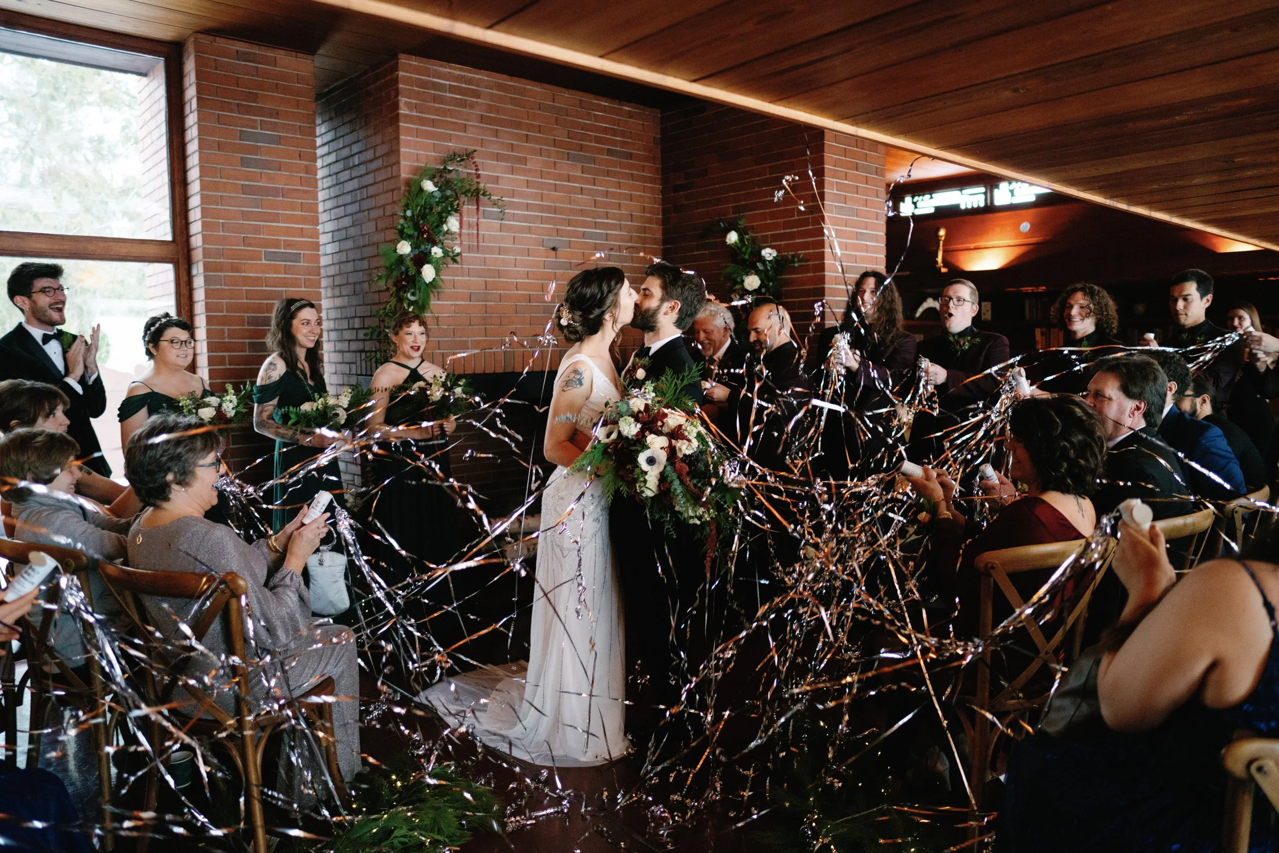 Bride and groom kiss at Naperville wedding ceremony
