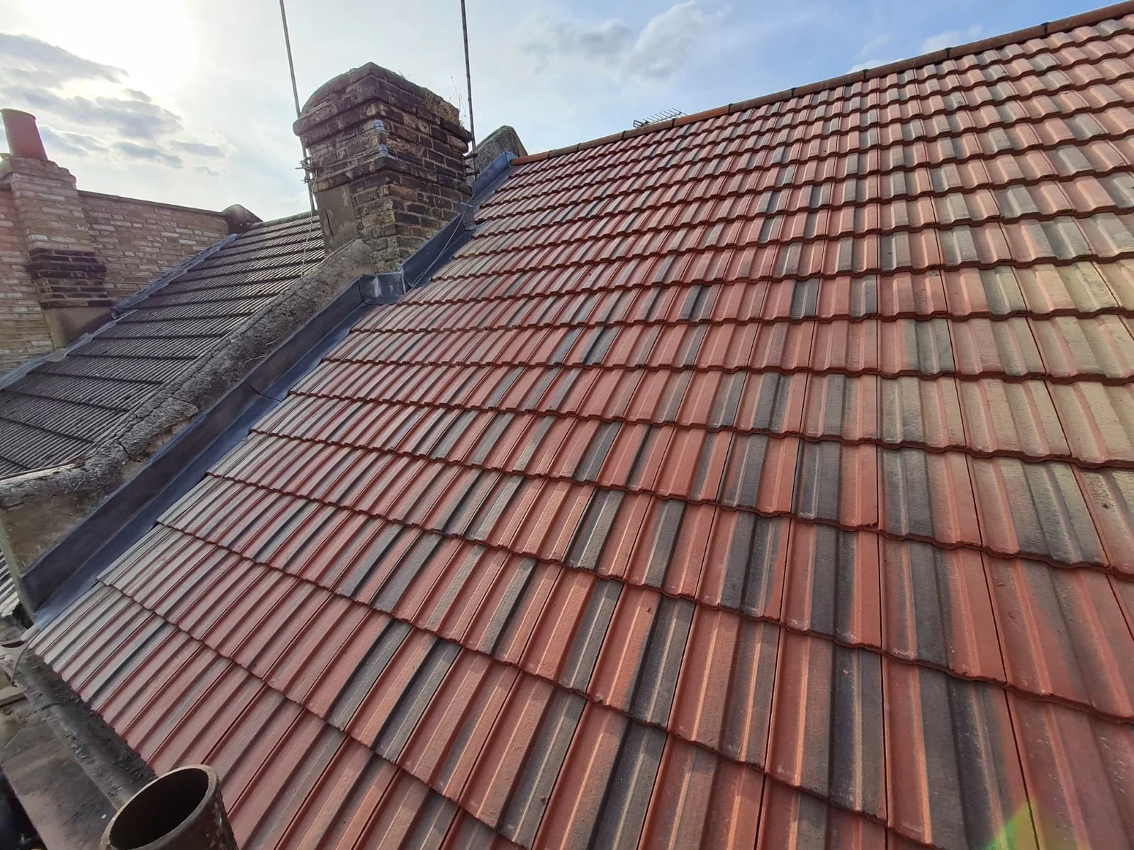 Pitched roof replacement on a semi-detached home in Surrey