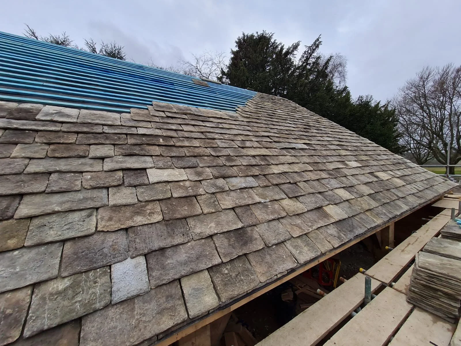 Pitched roof undergoing repair work by Crown Roofing & Leadwork