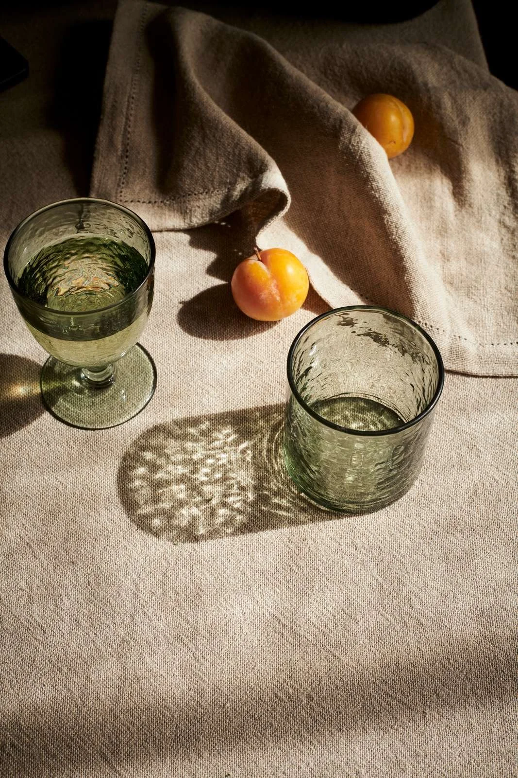 Artistic image with glassware on a tablecloth