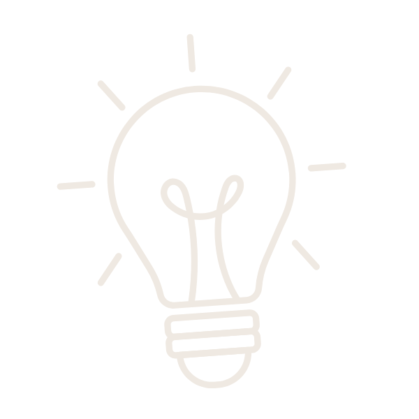 A simple line drawing of a glowing lightbulb with rays radiating outward.