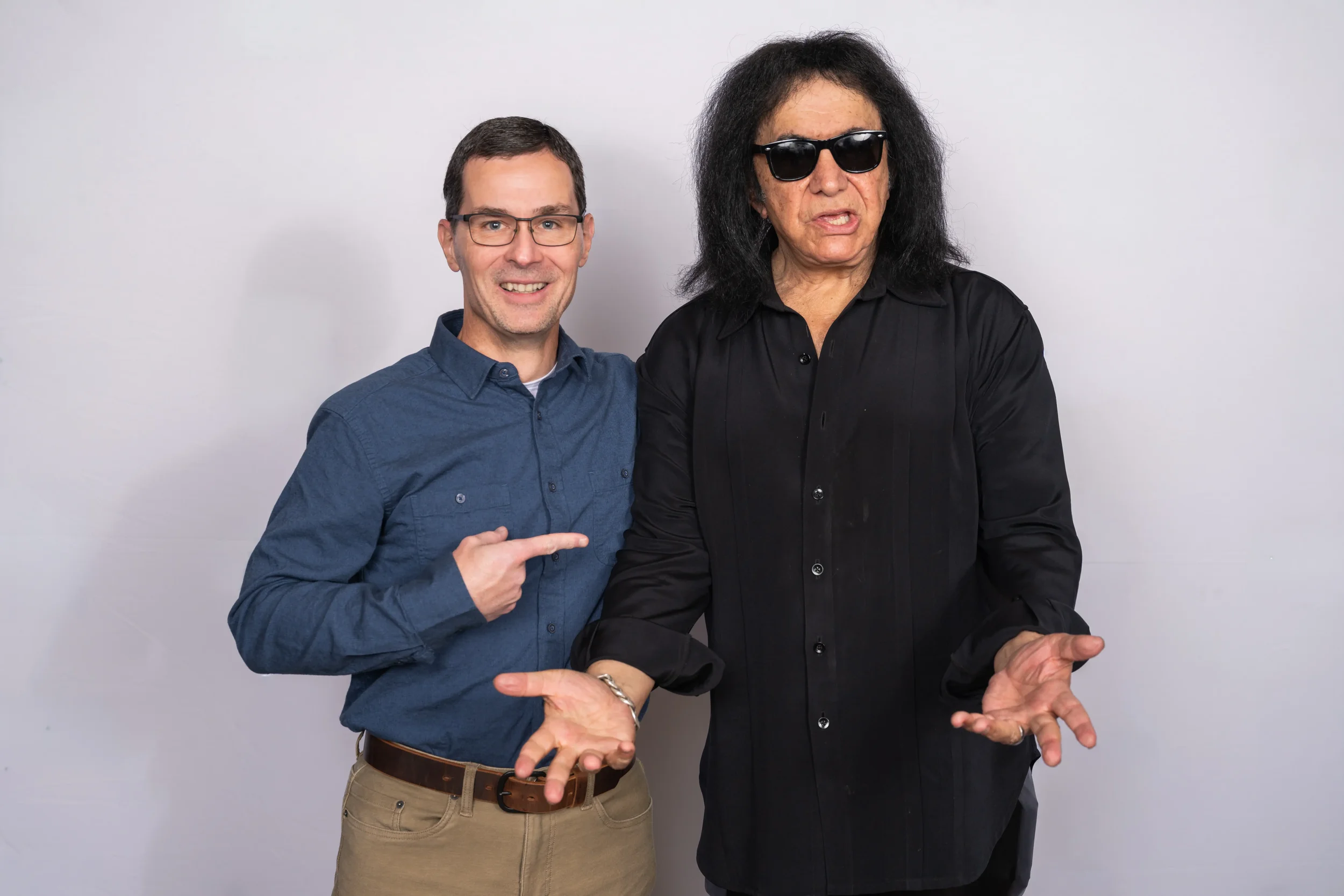 Neal Juern posing for a photo with Gene Simmons from Kiss.