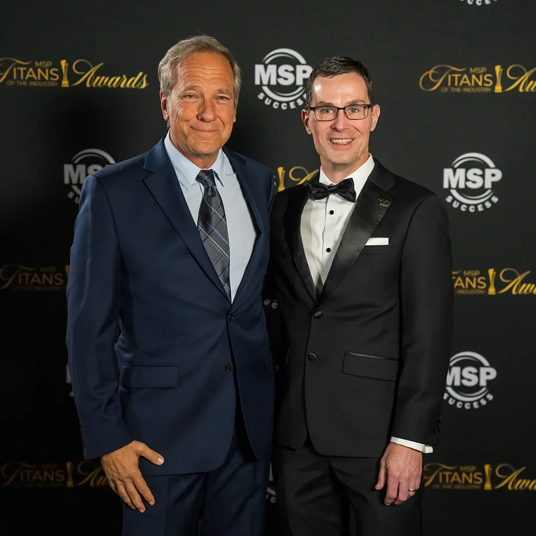 Neal Juern and Mike Rowe at the MSP Titans of the Industry awards 2025