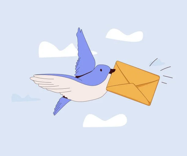A bluebird flying in the sky holding an envelope in its beak.