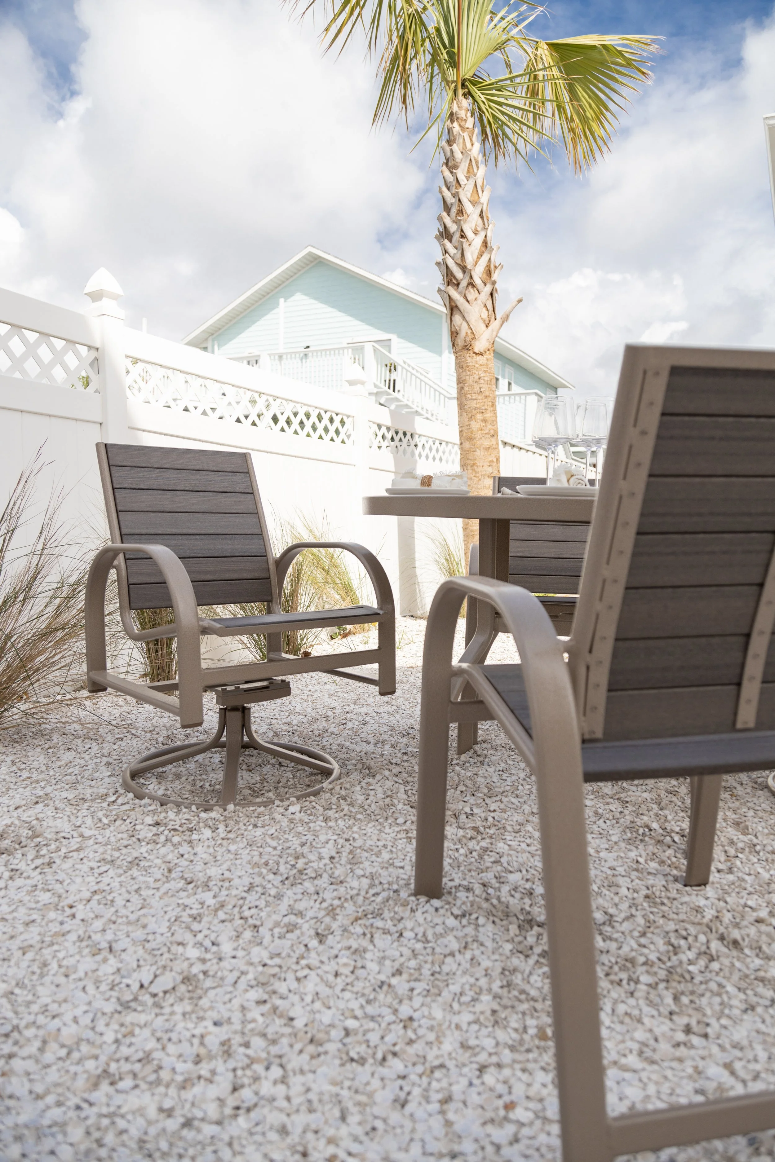 Murphy Poly Swivel Rocker Dining Chairs snd Murphy Dining Height Poly Chairs in Oak Wood Vein with Coastal Gray poly.jpg