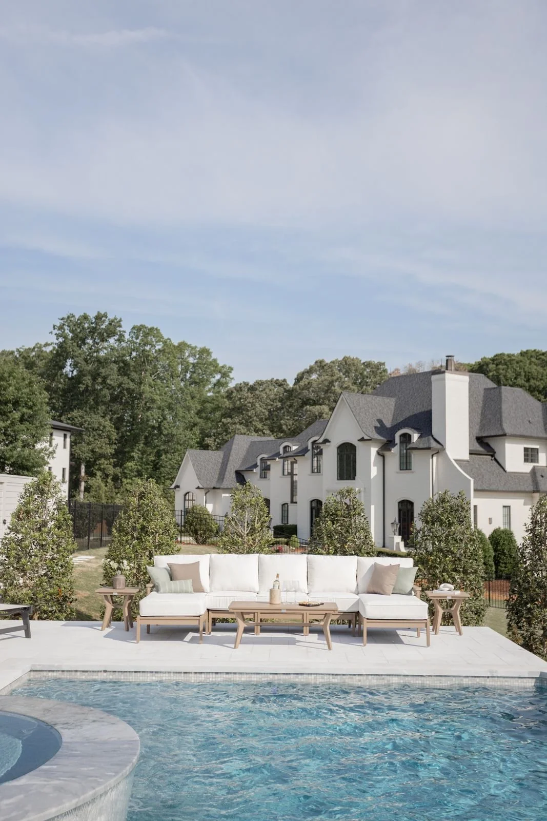 Mayhew Sectional, End Tables, and Coffee Table in Weatherwood. Cushions in Improve White.jpg