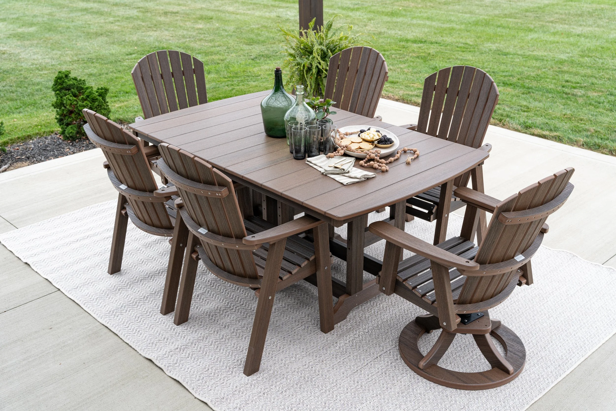 Garden Classic 44” x 72” Rectangular Dining Table in Brazilian Walnut. Comfo Back Dining Chairs and Comfo Back Swivel Rocker Dining Chairs in Brazilian Walnut.jpg